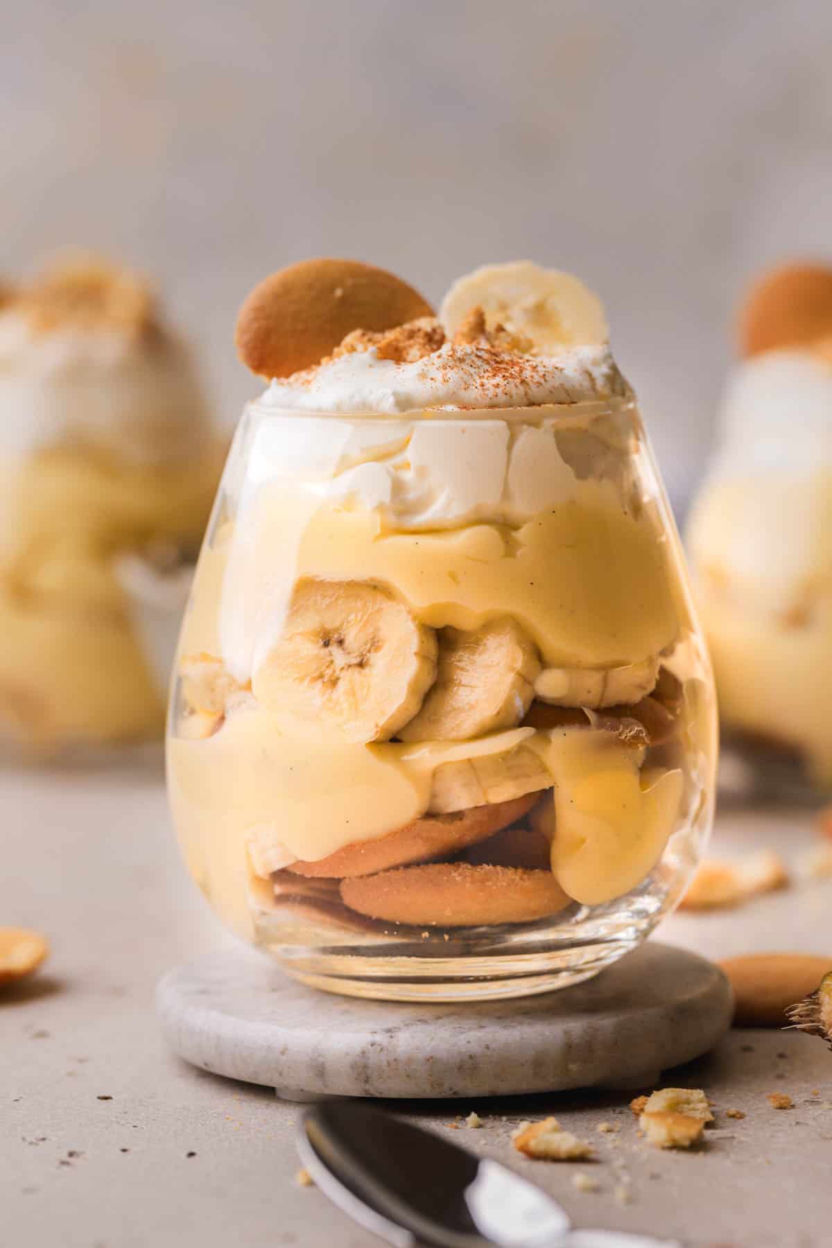 Banana pudding cups with layers of Nila wafers, bananas, custard and fresh whipped cream. 