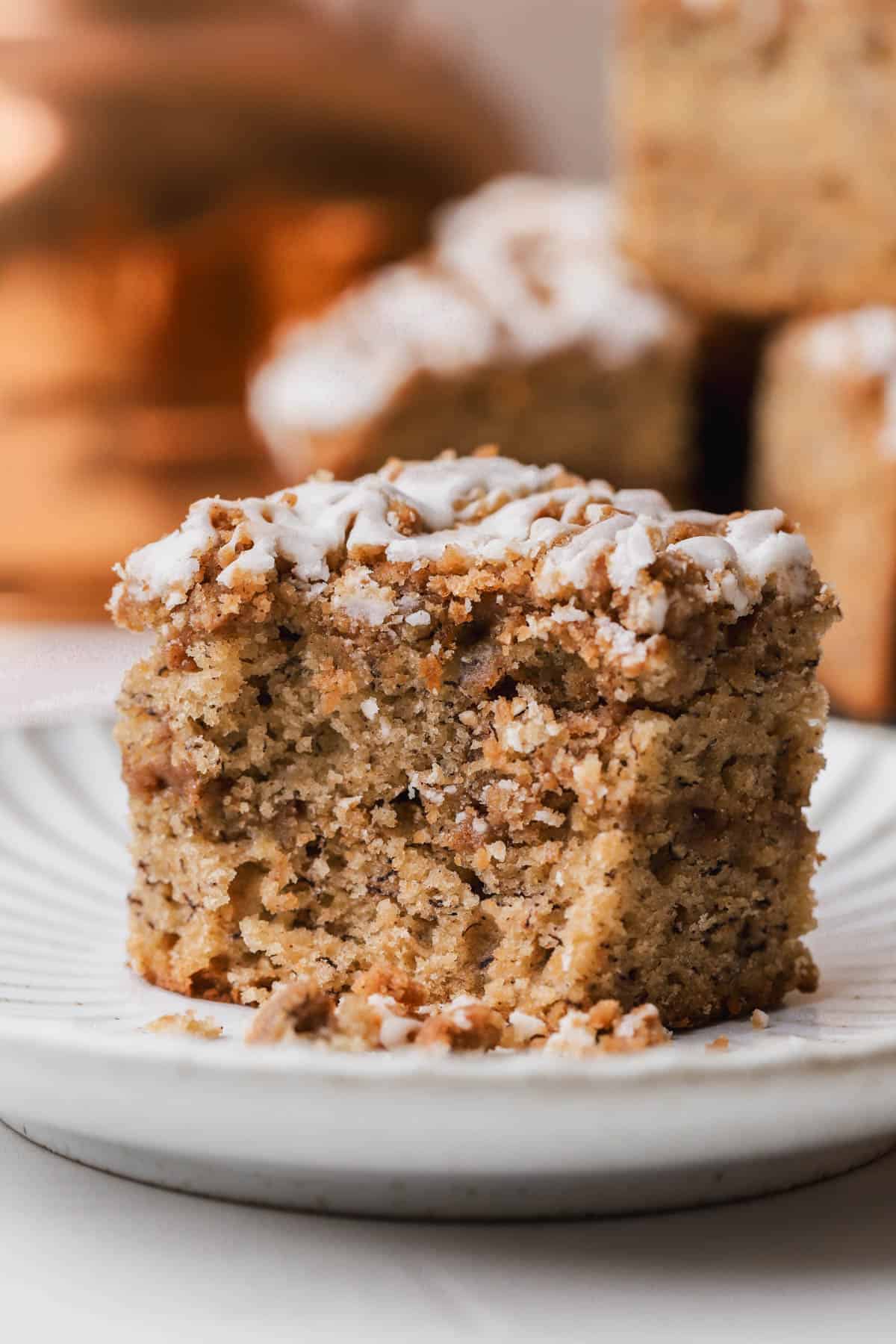 Moist banana bread with cinnamon crumble and vanilla icing. 