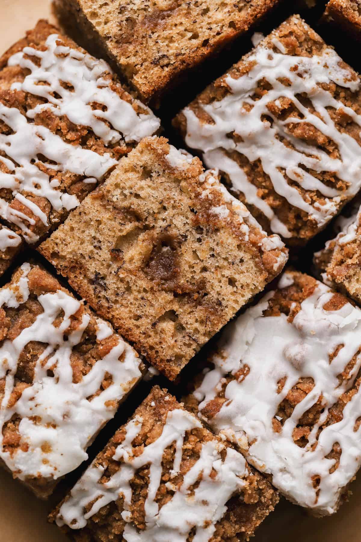 Banana bread coffee cake with cinnamon streusel and vanilla icing.
