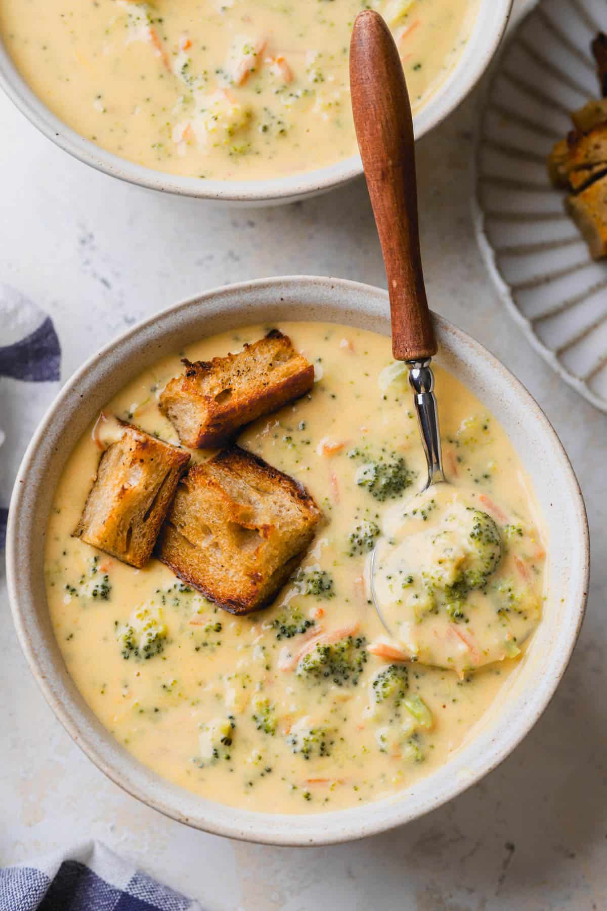 Gluten free broccoli cheddar soup with garlic, cream cheese, carrots and toasted croutons.