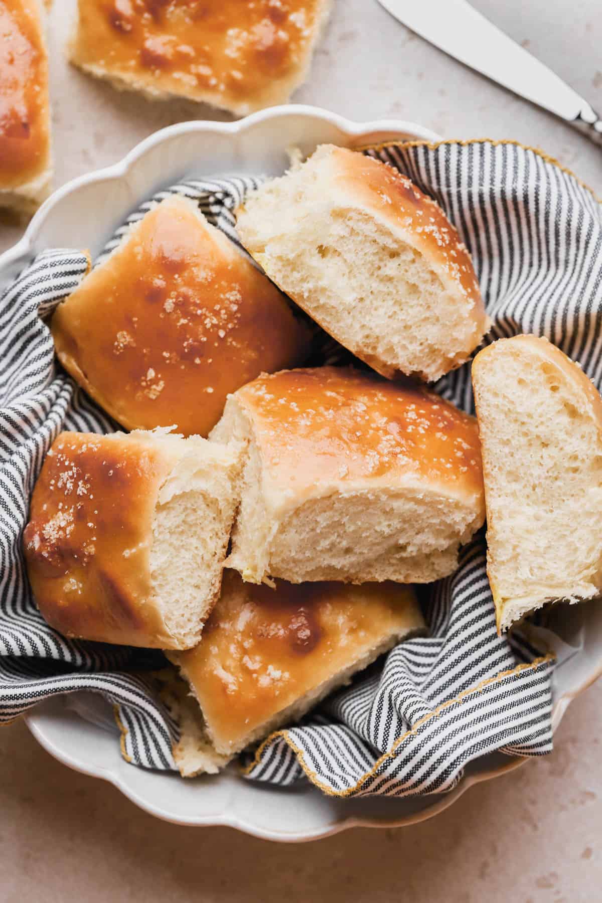 Pull apart bread rolls with sea salt and homemade honey butter. 