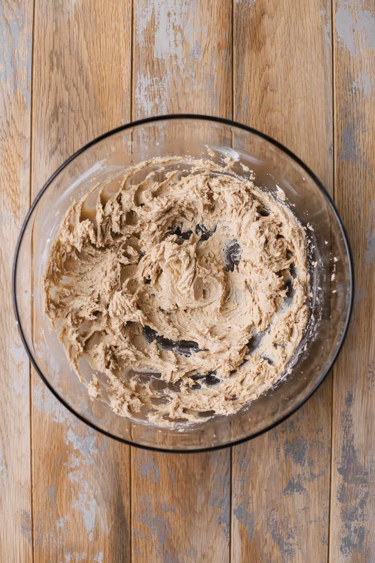 Creamed butter with sugar and brown sugar. 