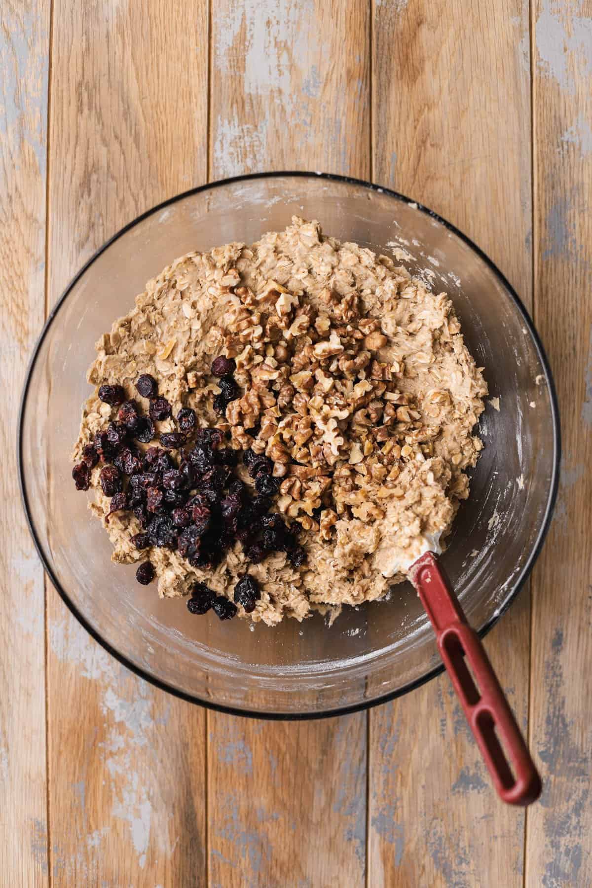 Oatmeal cookie dough with cranberries and walnuts. 