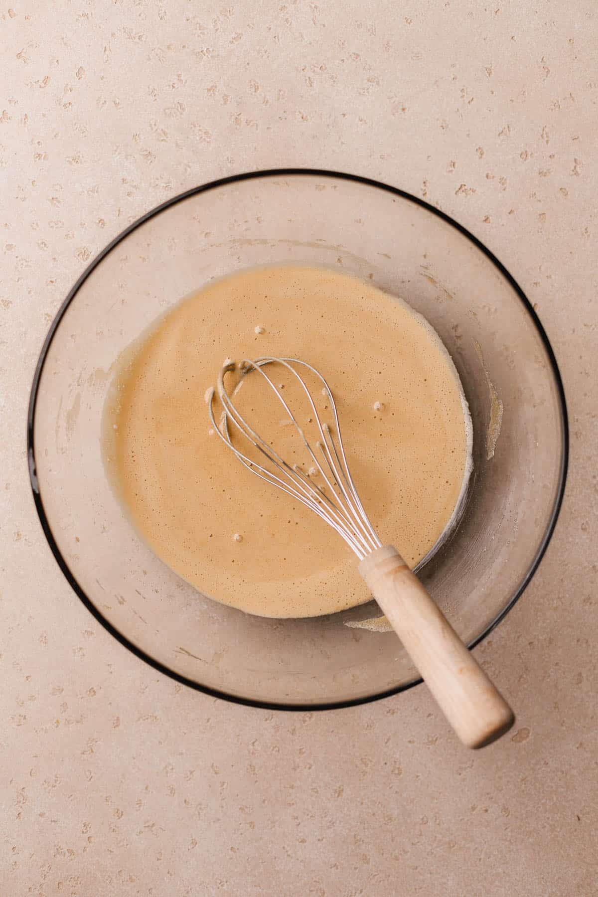 Whipped eggs, sugar, brown sugar, and vanilla. 