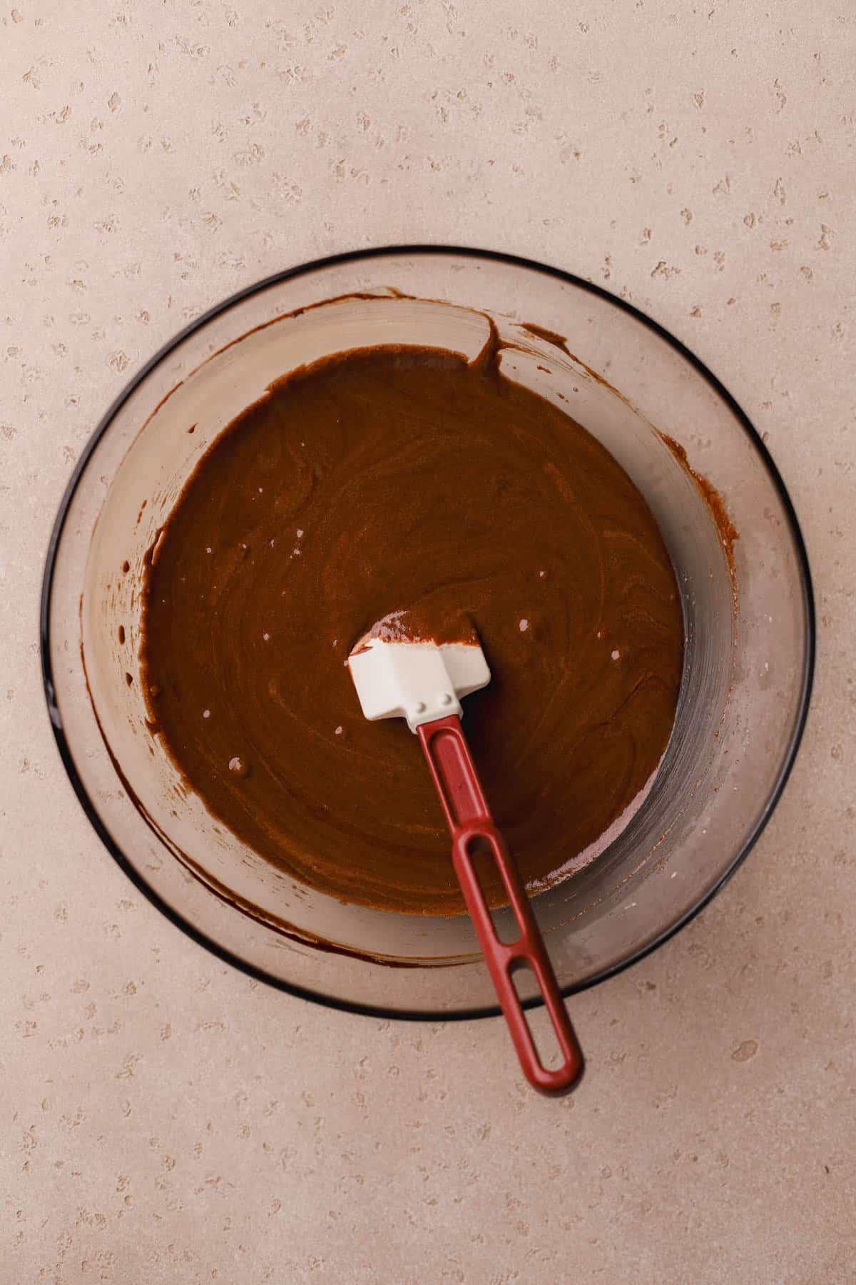 Whipped eggs, sugar, brown sugar, vanilla, melted chocolate, and melted butter. 