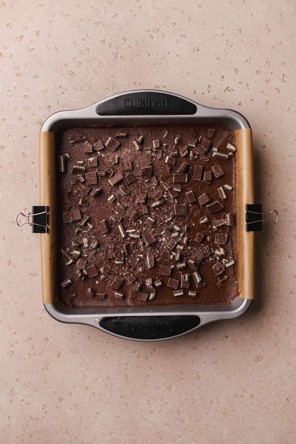 Brownie batter topped with Andes mint candies.  