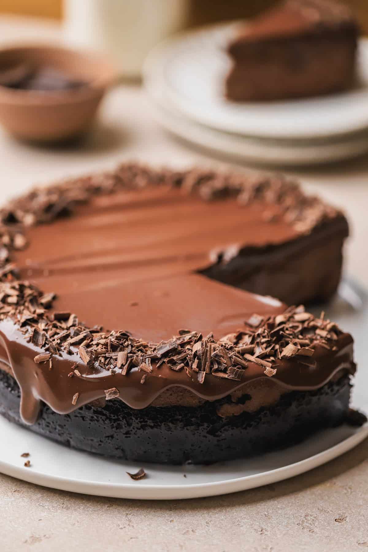 Chocolate ganache cheesecake with shaved chocolate and Oreo crust. 