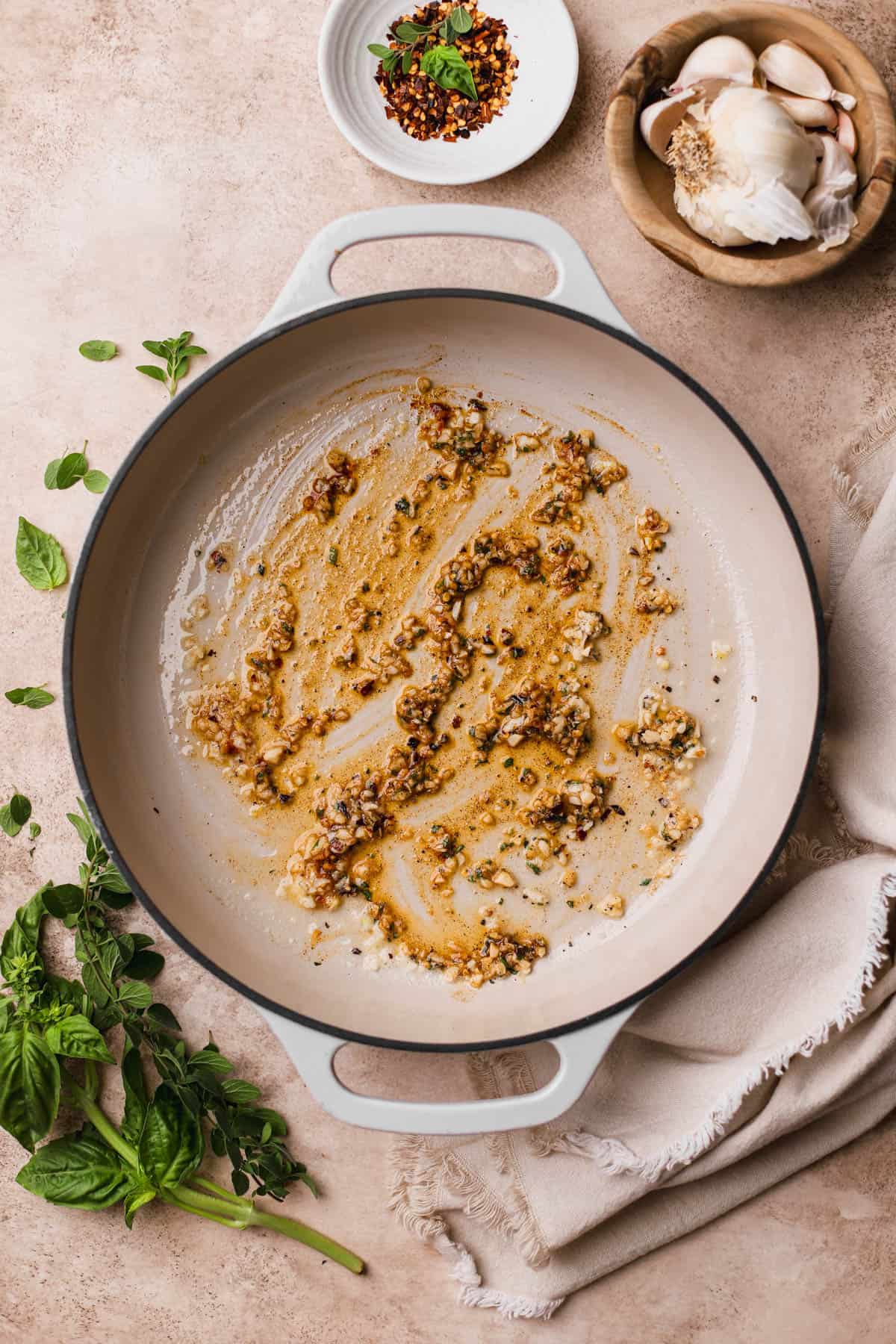 Sauteed garlic, red pepper flakes, smoked paprika, and oregano.