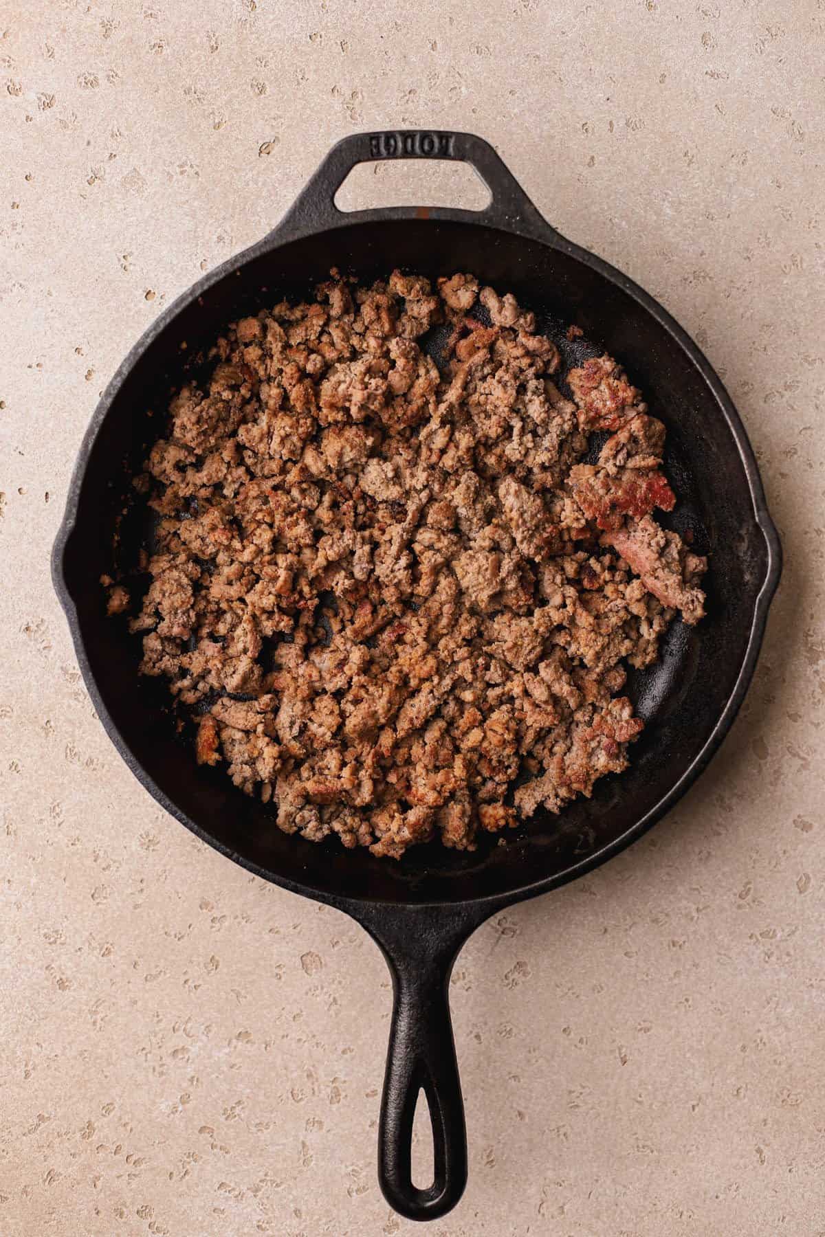 Seared ground beef, onion powder, garlic powder, salt, pepper, and paprika.