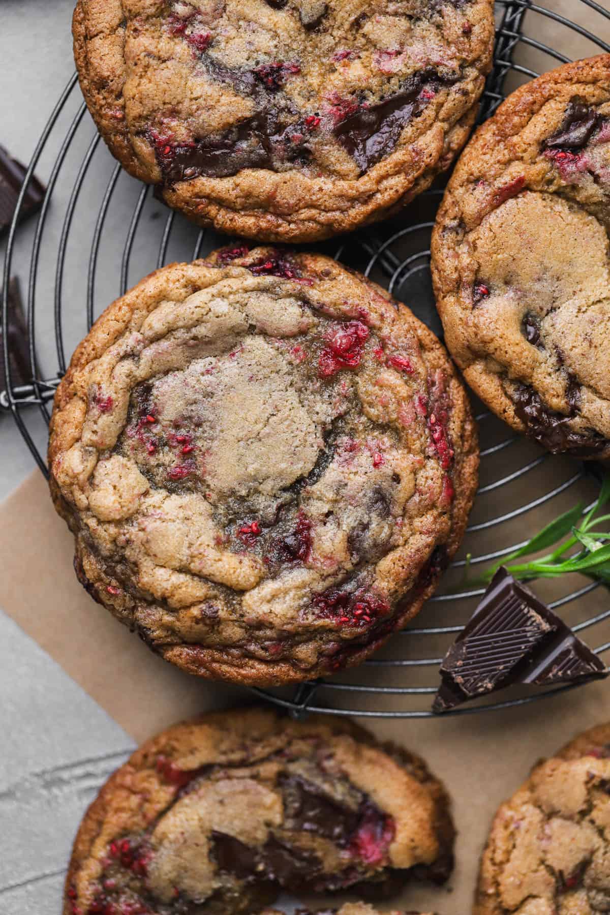 Raspberry chocolate chip cookies with frozen raspberries and dark chocolate chunks. 