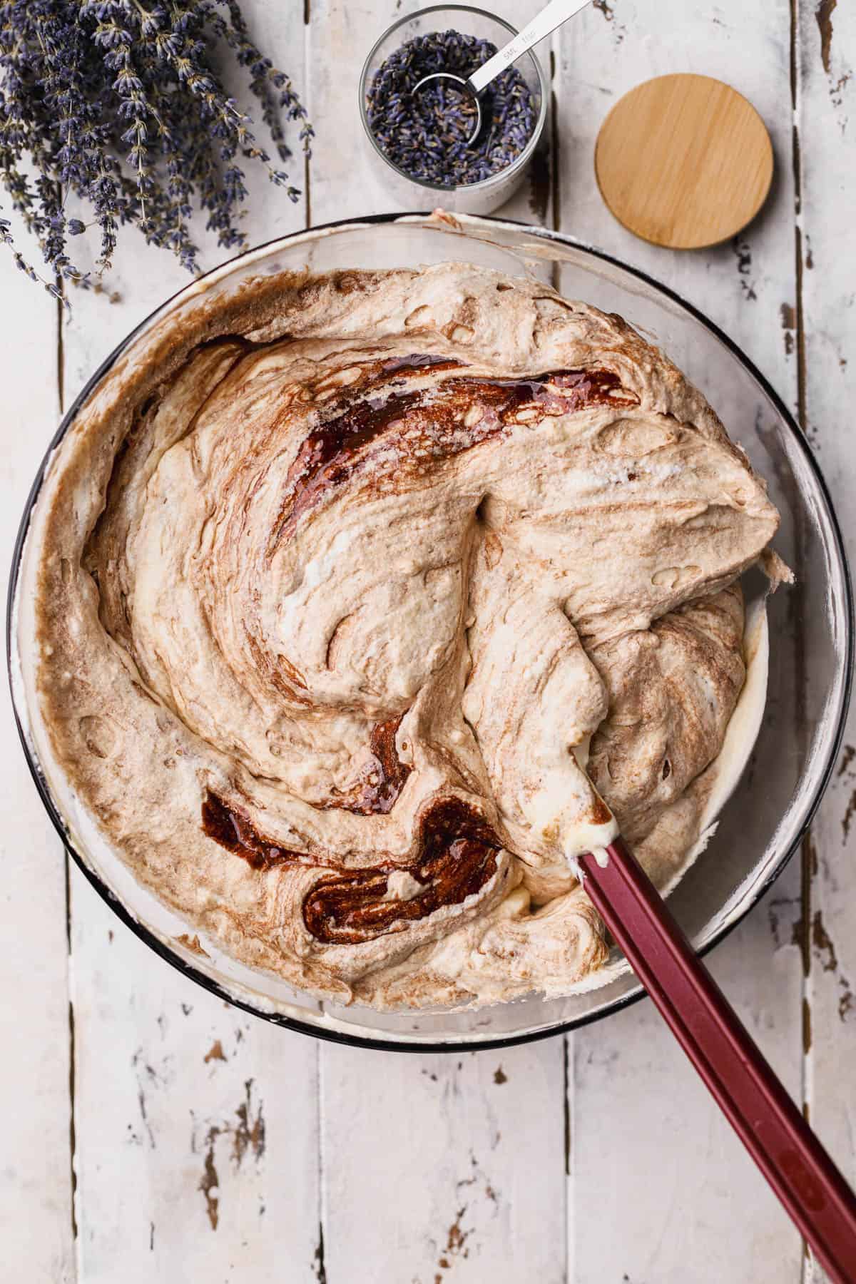 Whipped egg whites with sugar, vanilla, egg yolks, and melted chocolate and butter. 