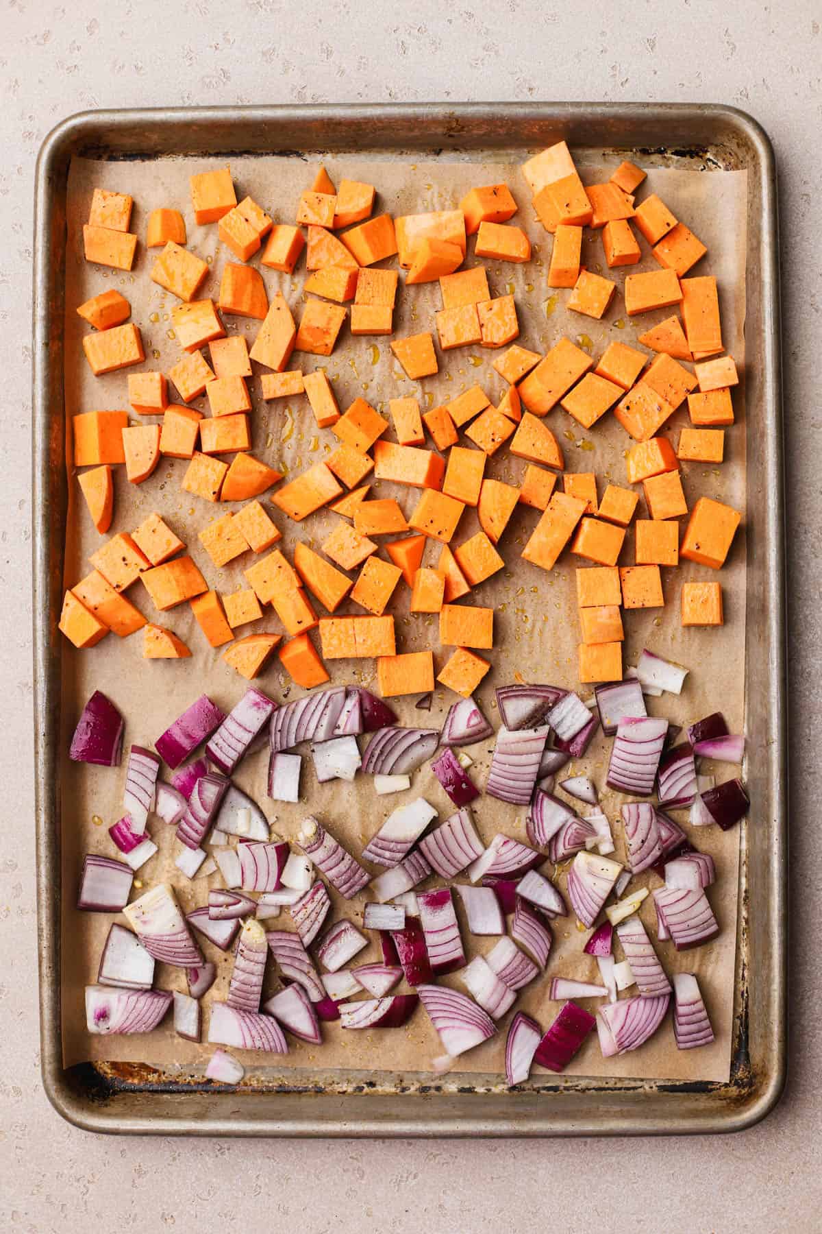 Diced sweet potato, red onions, olive oil, salt and pepper. 