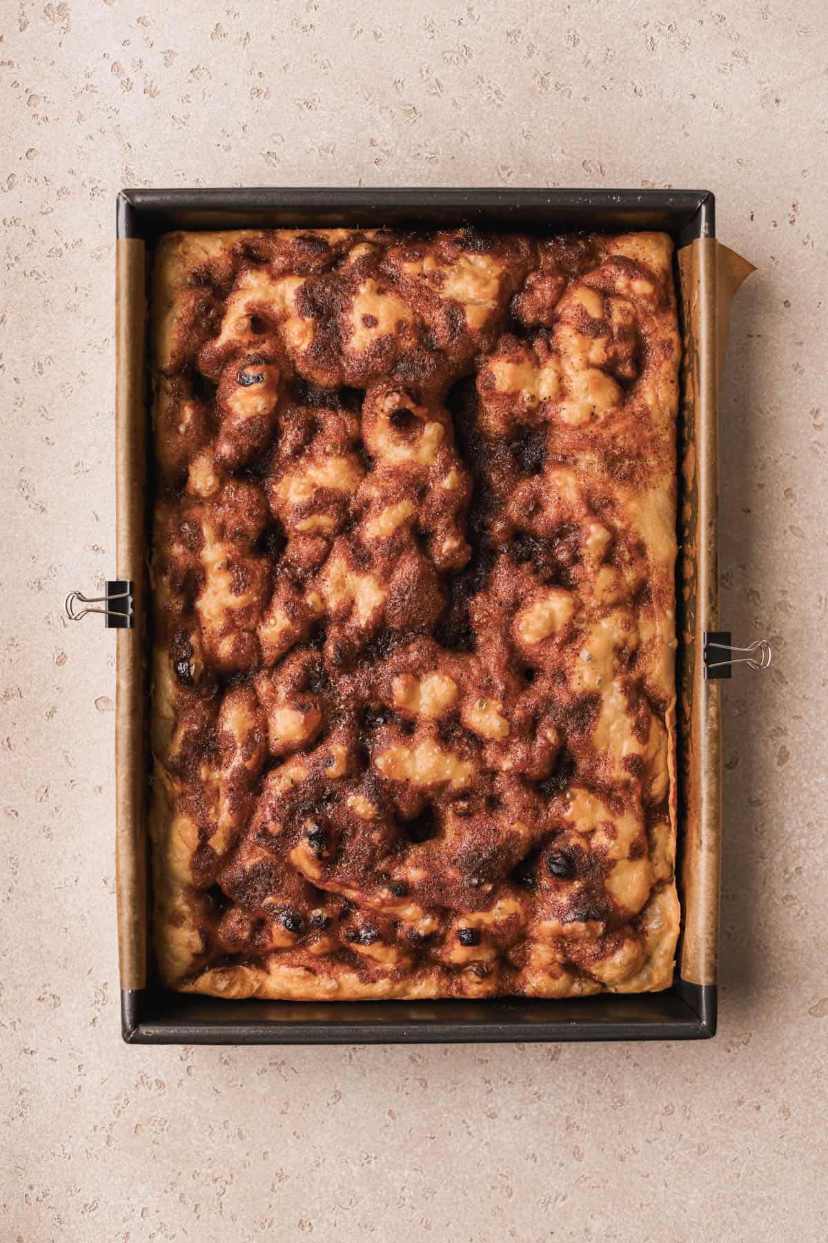 Baked cinnamon focaccia.