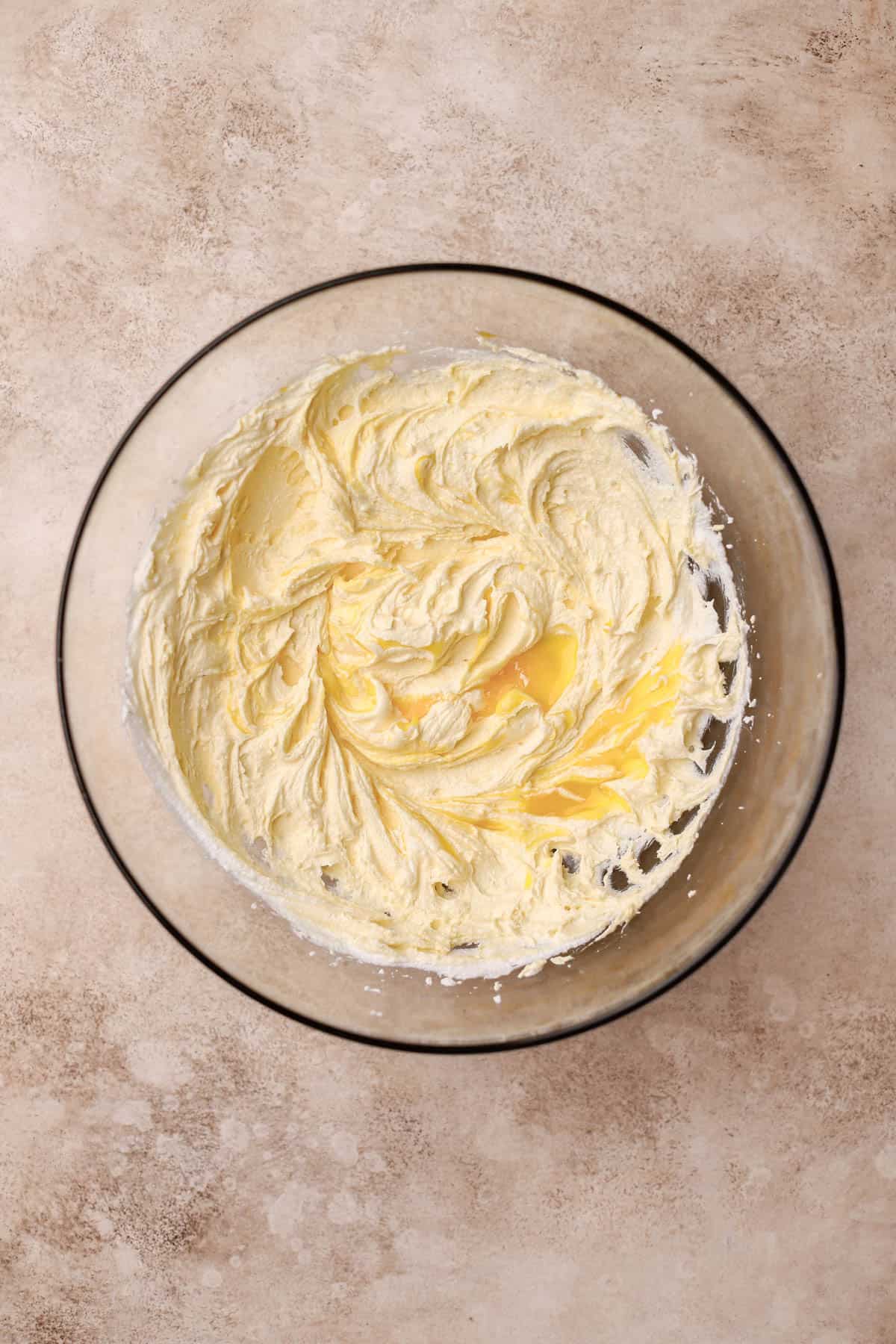 Whipped butter, sugar, oil, eggs, and vanilla. 