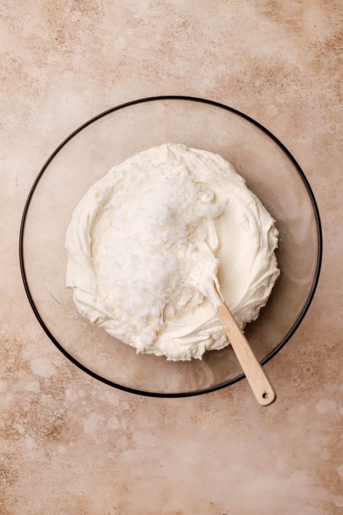 Coconut cake batter with shredded coconut. 
