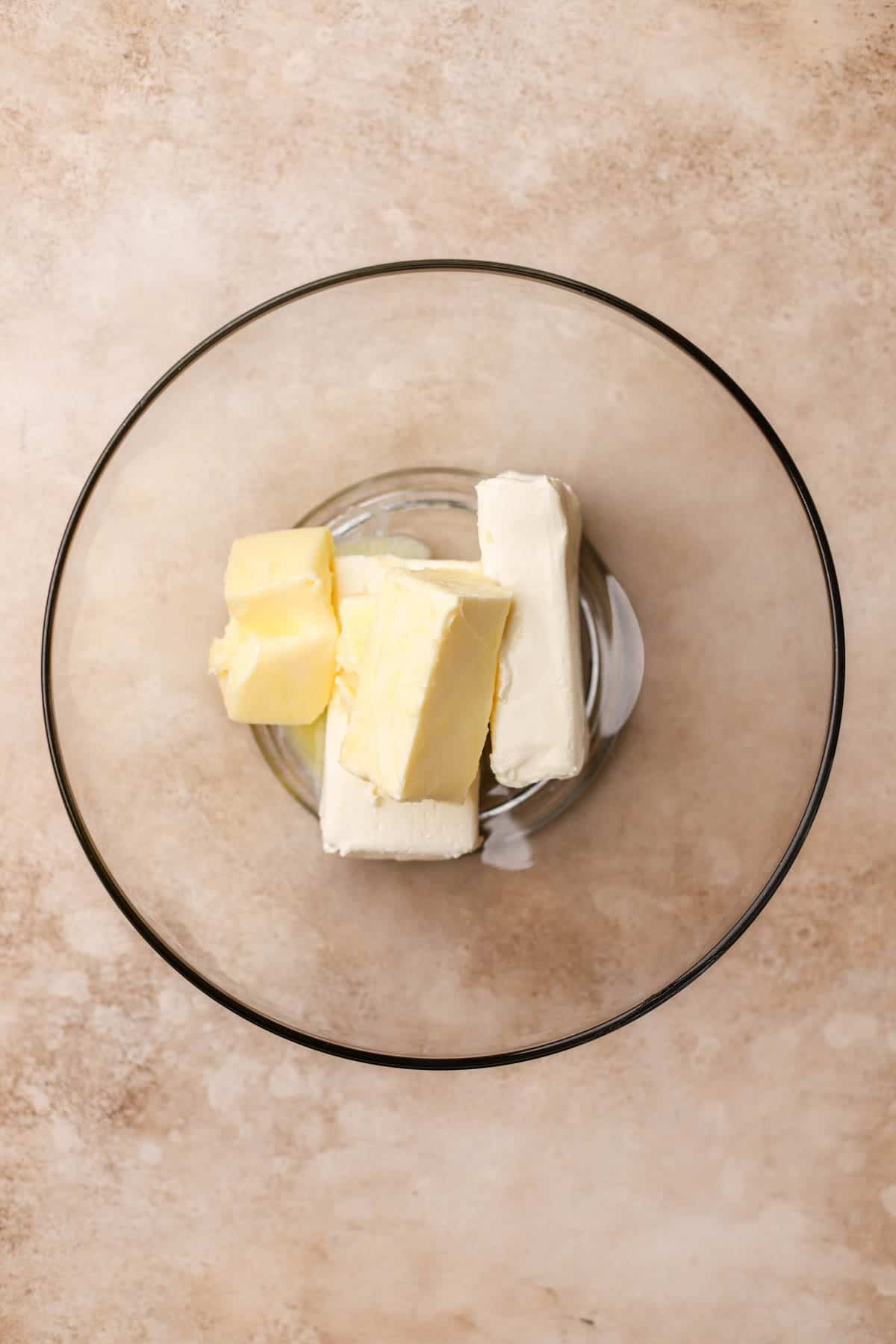 Softened butter and cream cheese. 