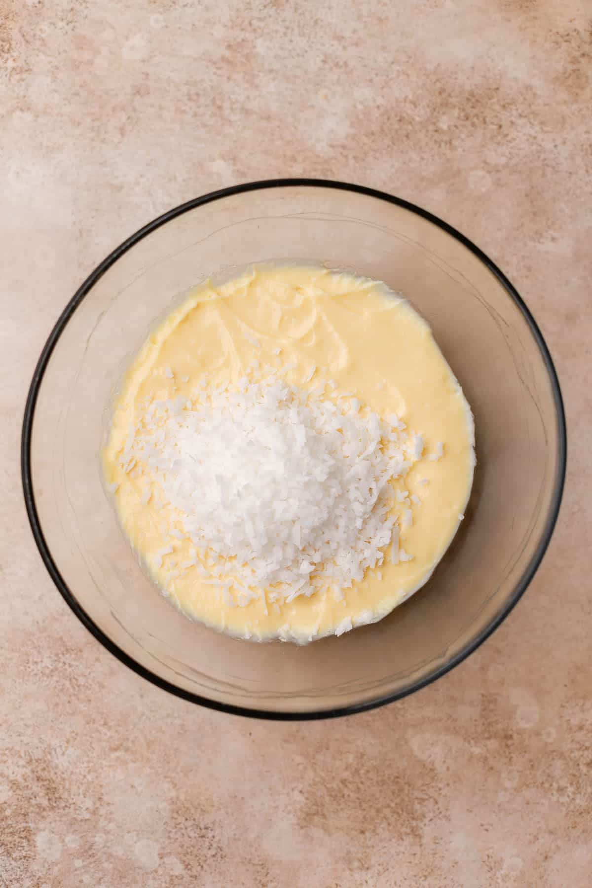 Pastry cream with shredded coconut. 
