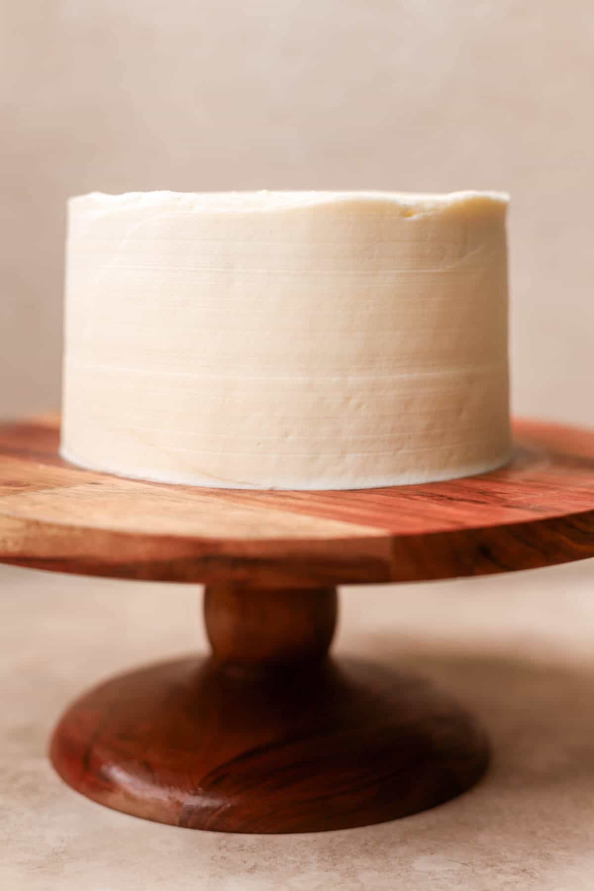 Coconut cake final coat of frosting. 