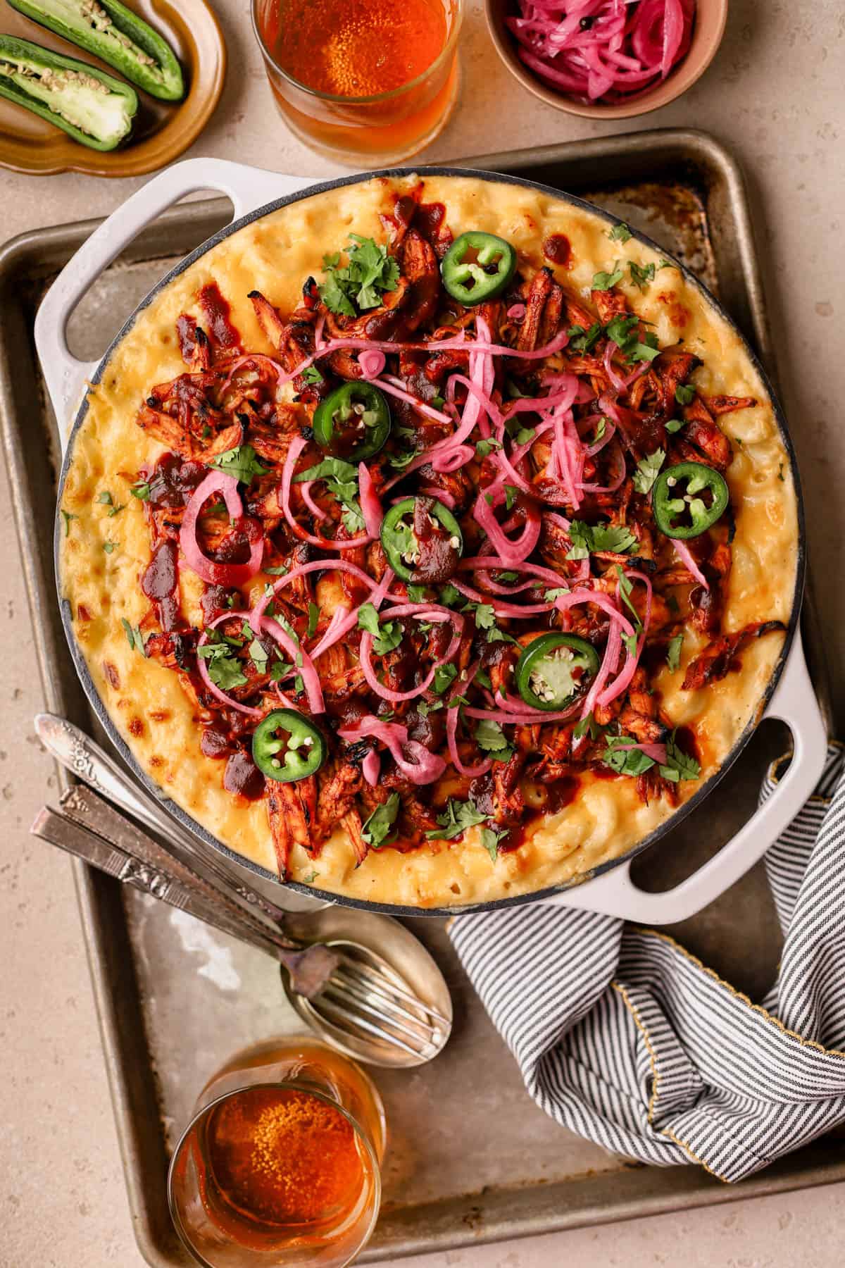 BBQ Chicken Mac and Cheese with cheddar cheese, jalapeno peppers, pickled onions, and fresh cilantro. 