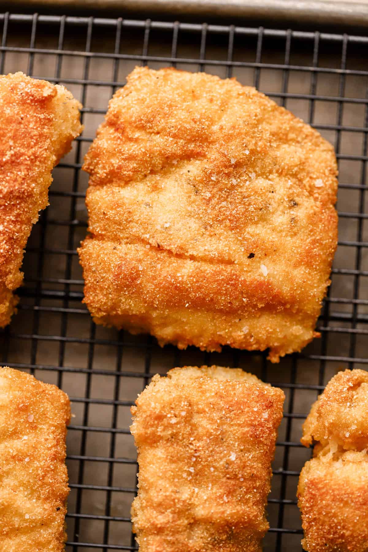 Crispy cod coated in breadcrumbs, cornmeal, and pan-fried until golden brown. 