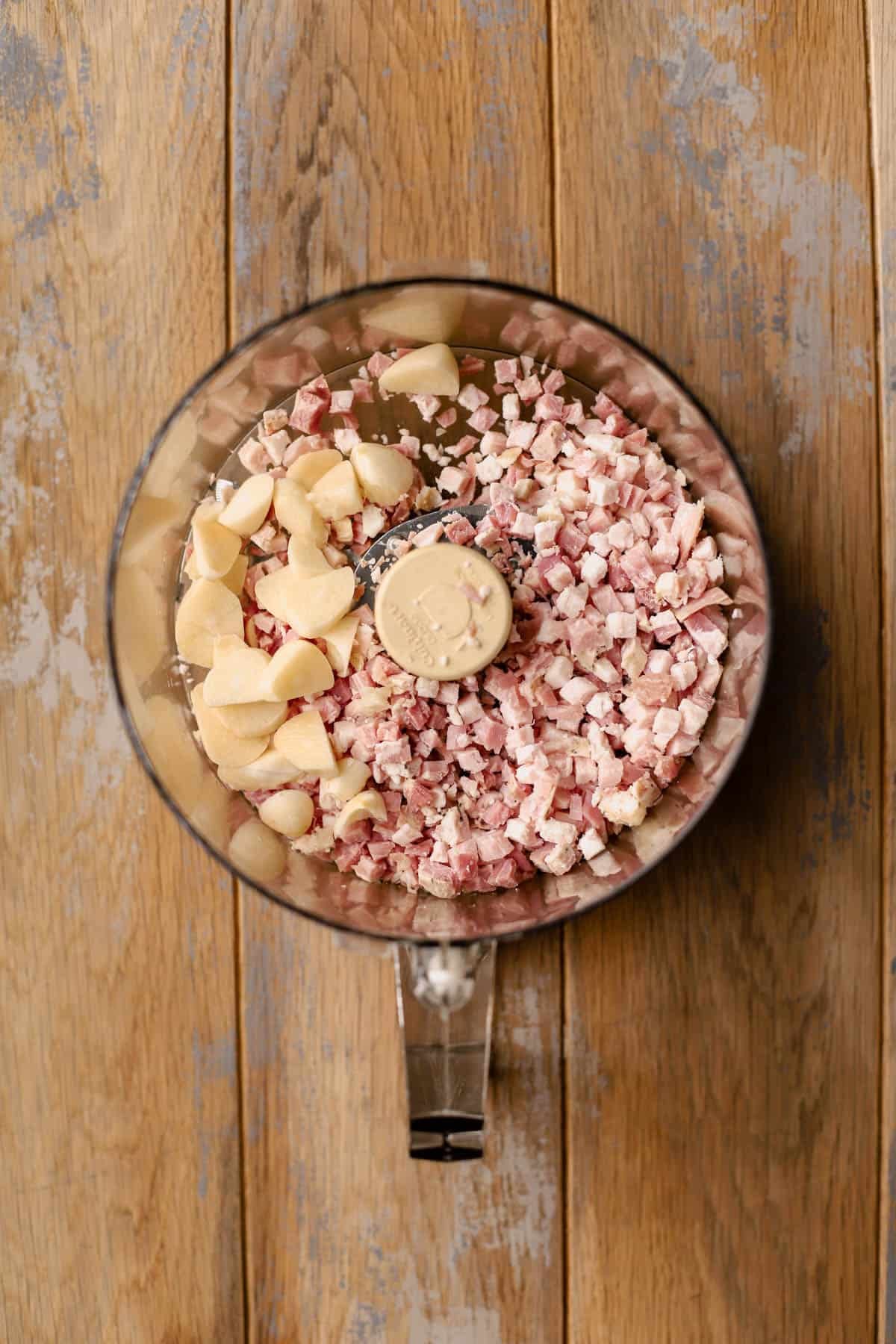 Whole garlic cloves and pancetta. 