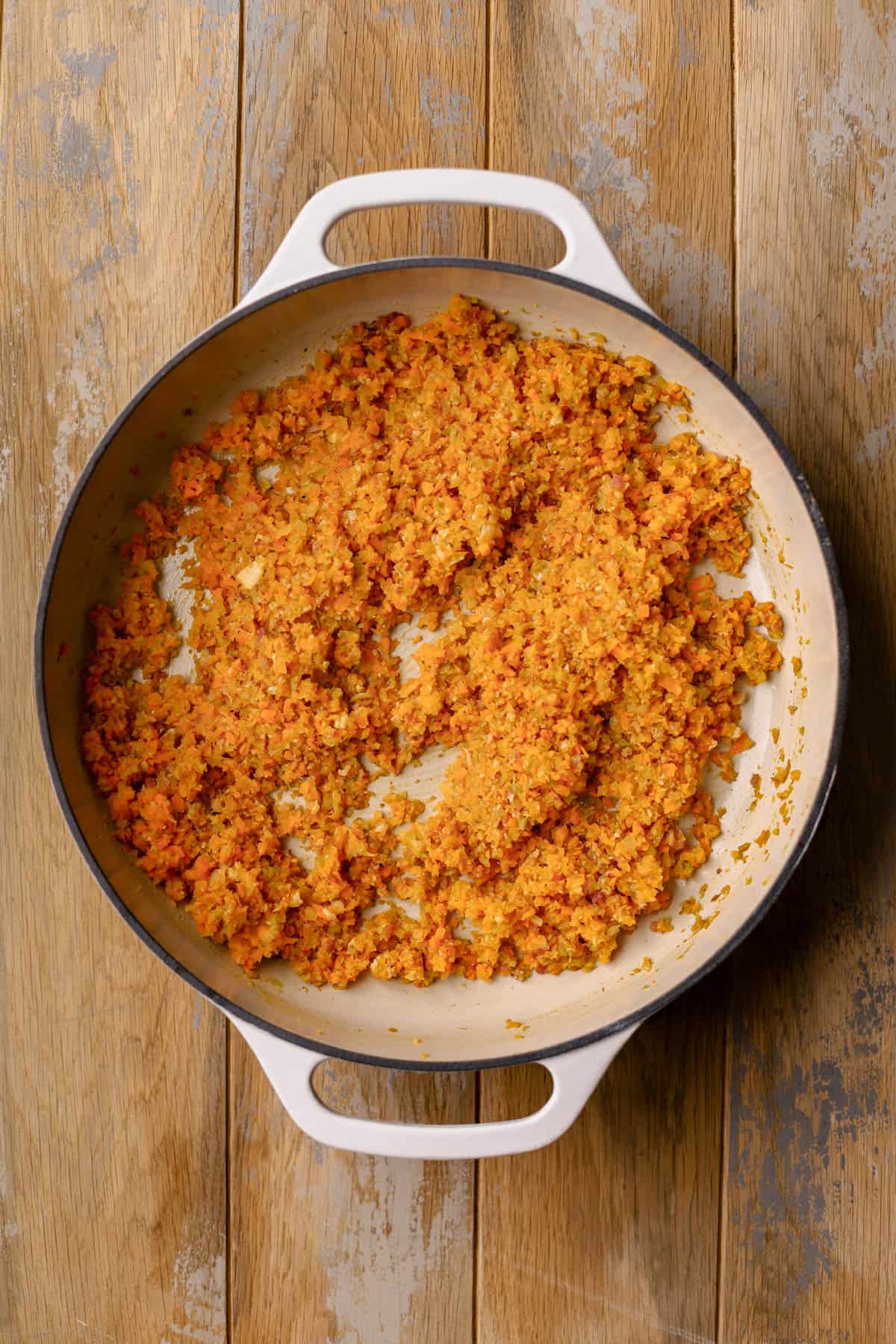 Sauteed pancetta, garlic, carrots, onions, celery, and carrots.