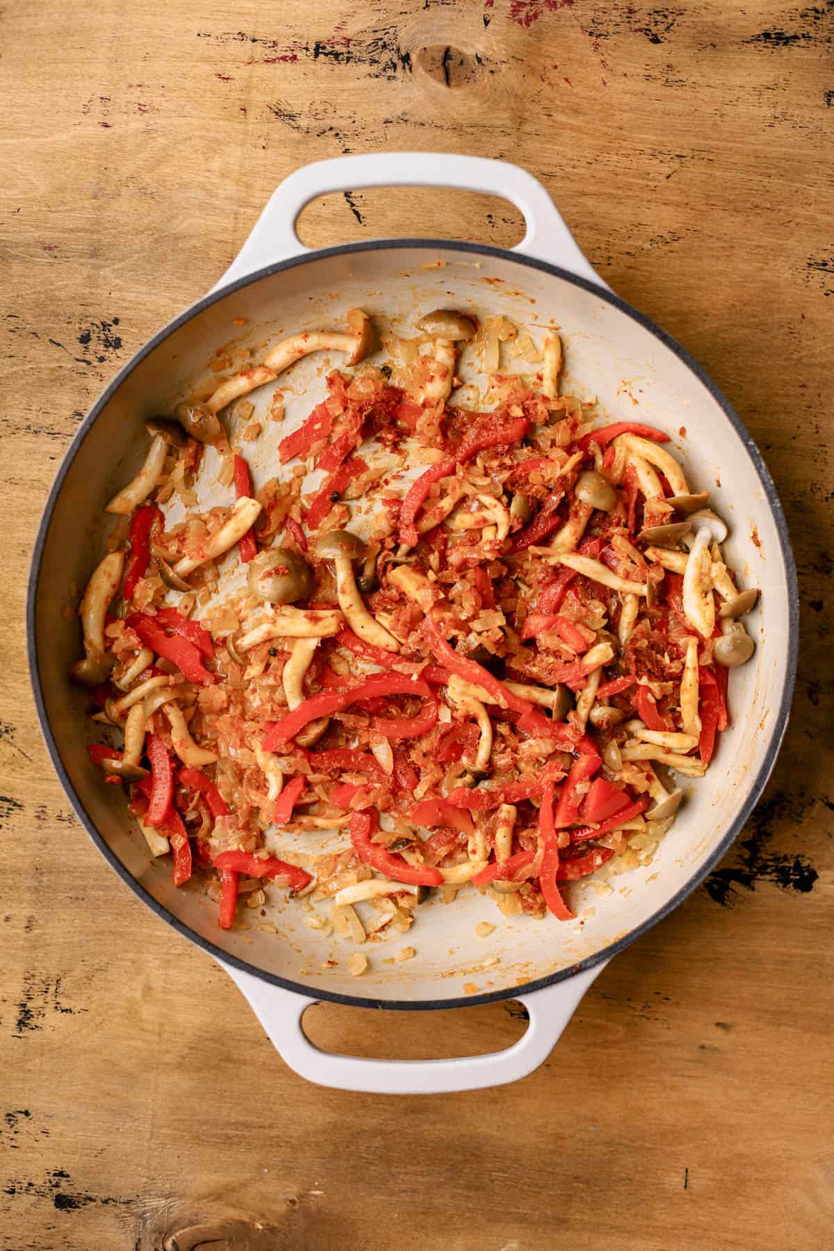 Sauteed onions, garlic, ginger, beech mushrooms, red bell peppers and red curry paste.