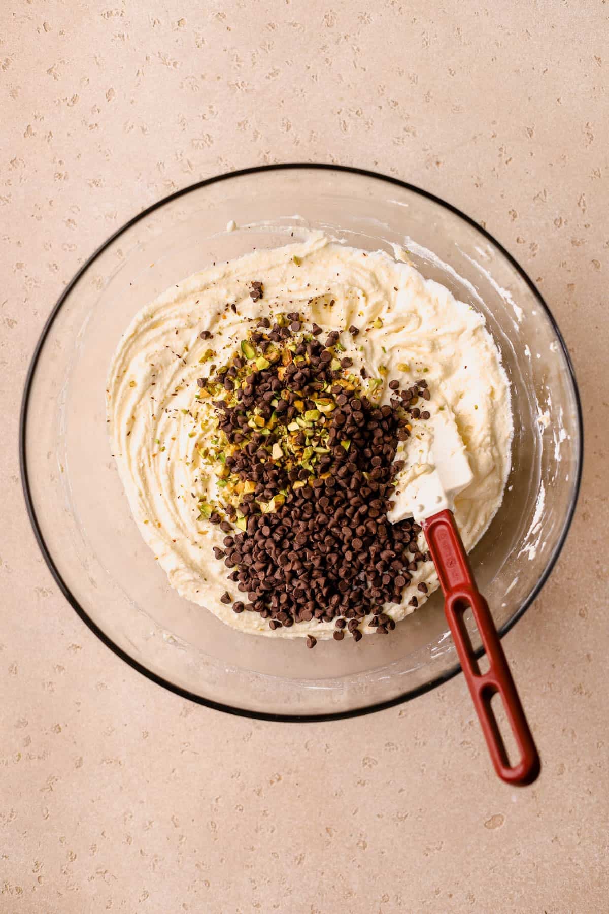 Ricotta cheesecake filling with mini chocolate chips and diced pistachios. 