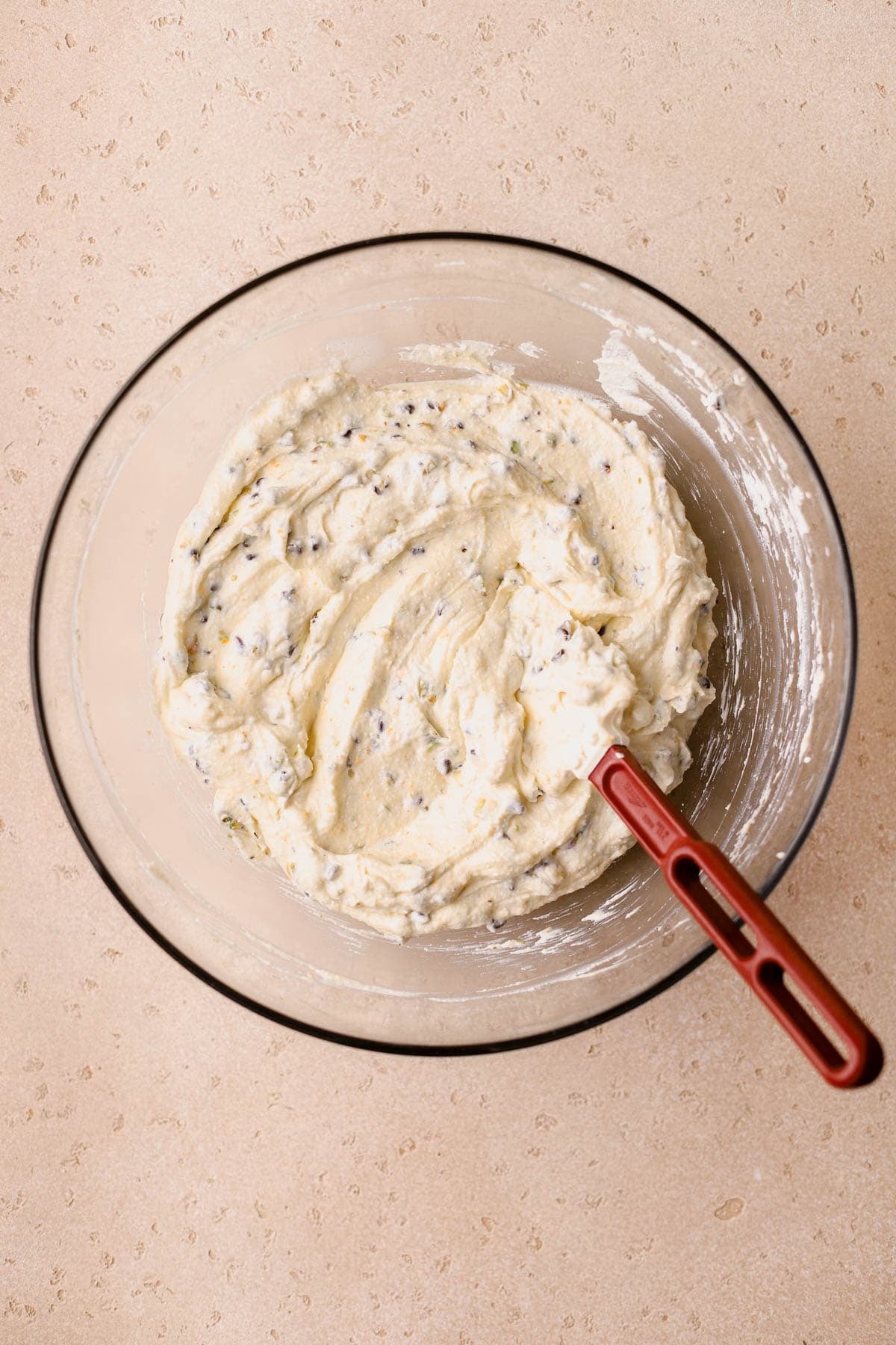 Cannoli cheesecake filling with mini chocolate chips and diced pistachios. 