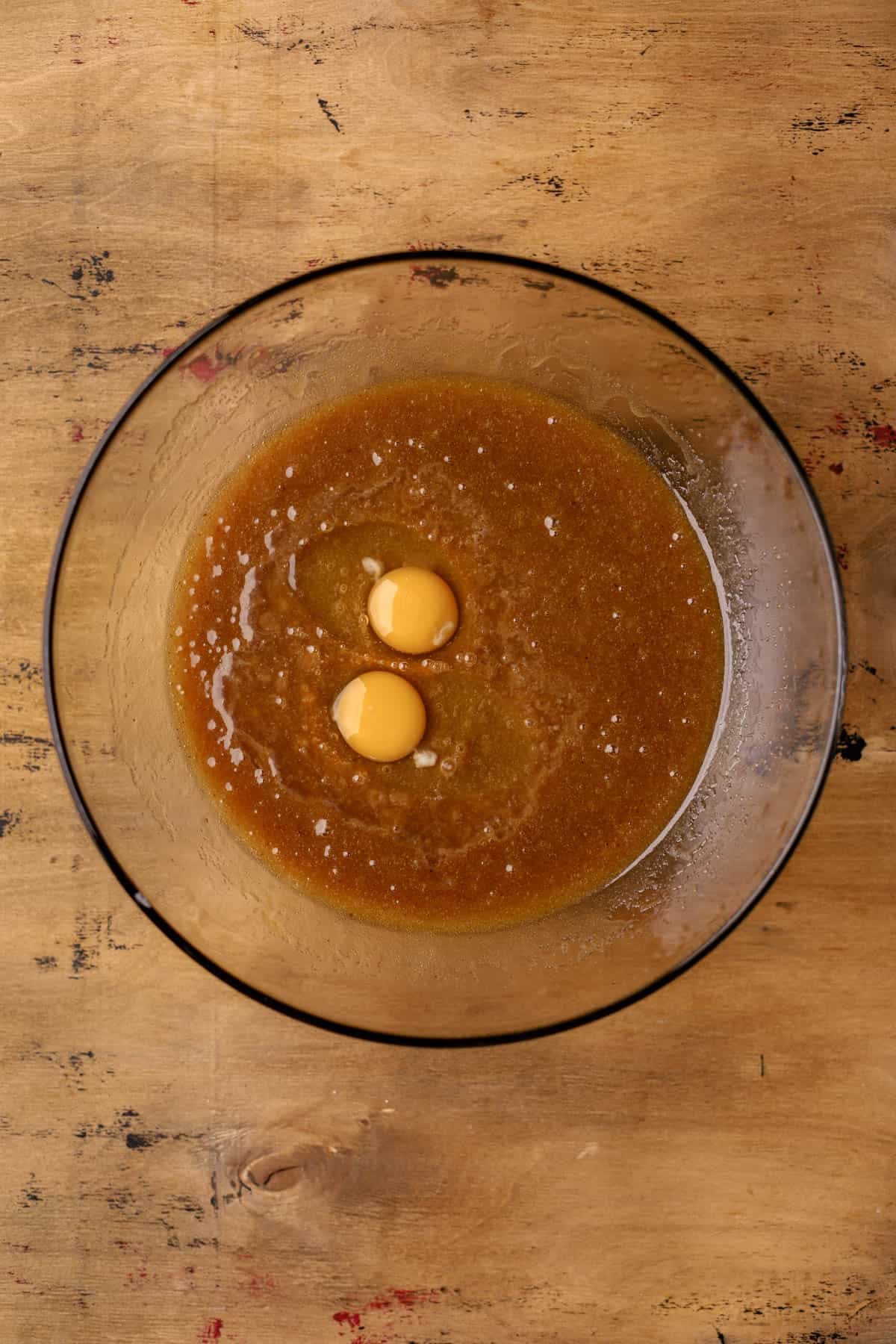 Brown butter, brown sugar, maple syrup, eggs, vanilla, and canola oil.  