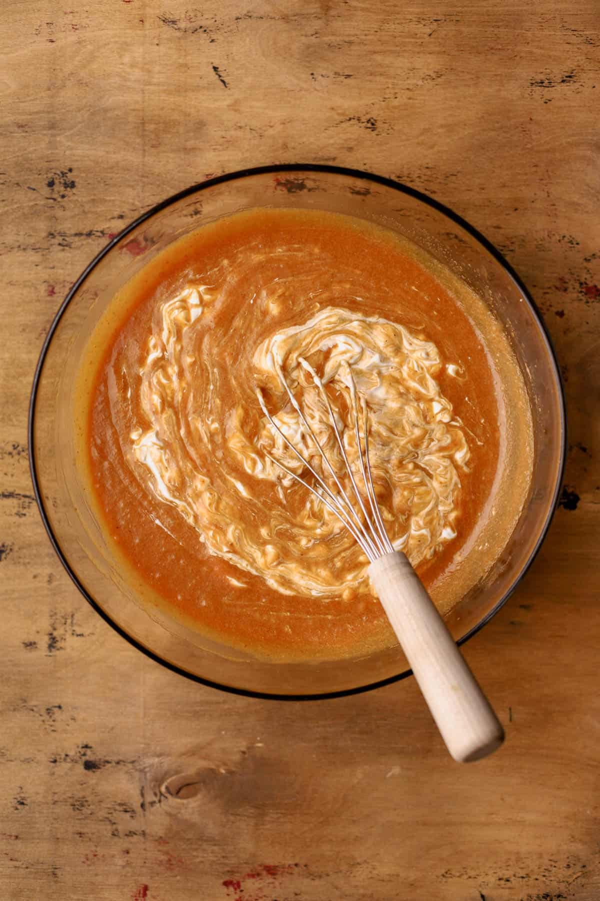 Brown butter, brown sugar, maple syrup, eggs, vanilla, pumpkin puree, sour cream, and, canola oil.  