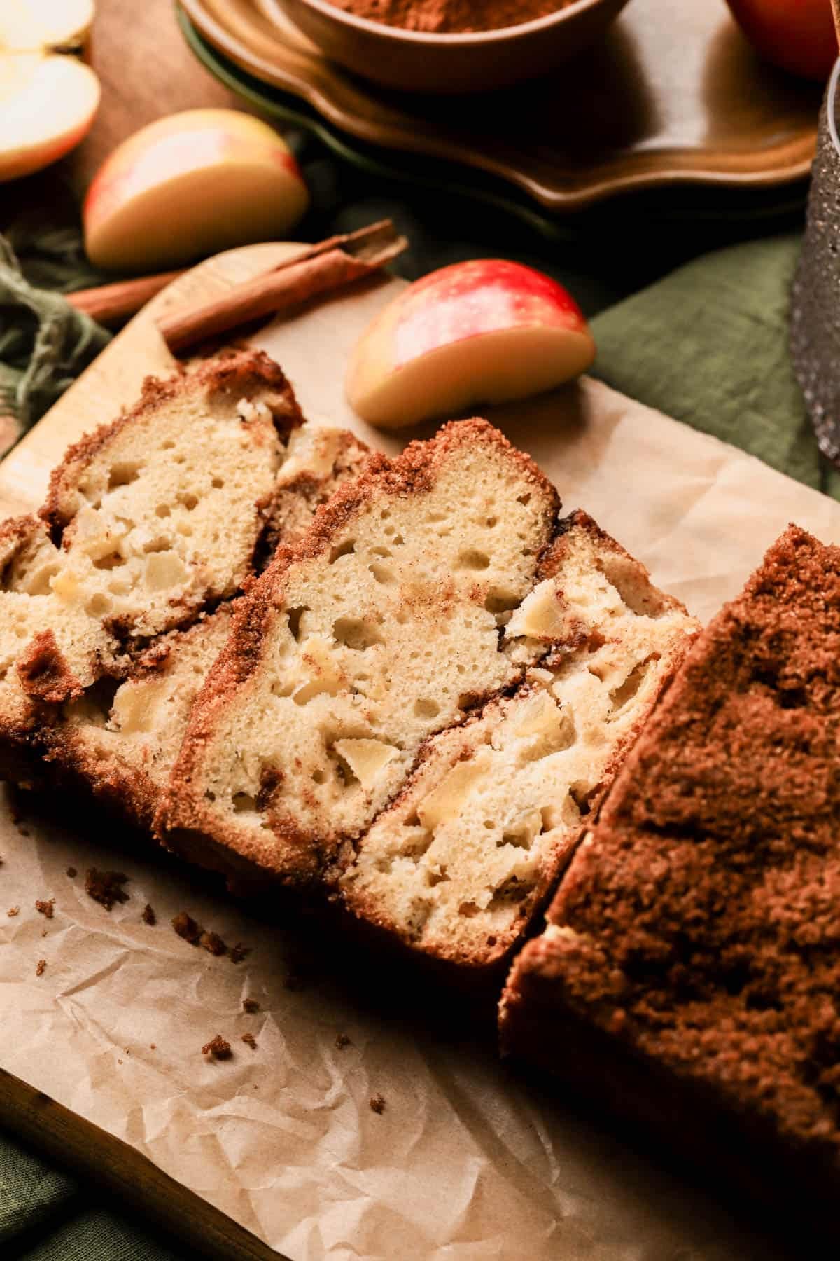 Apple cinnamon loaf cake is made with Honeycrisp apples, sour cream, butter, sugar, and swirled with brown sugar and cinnamon. 