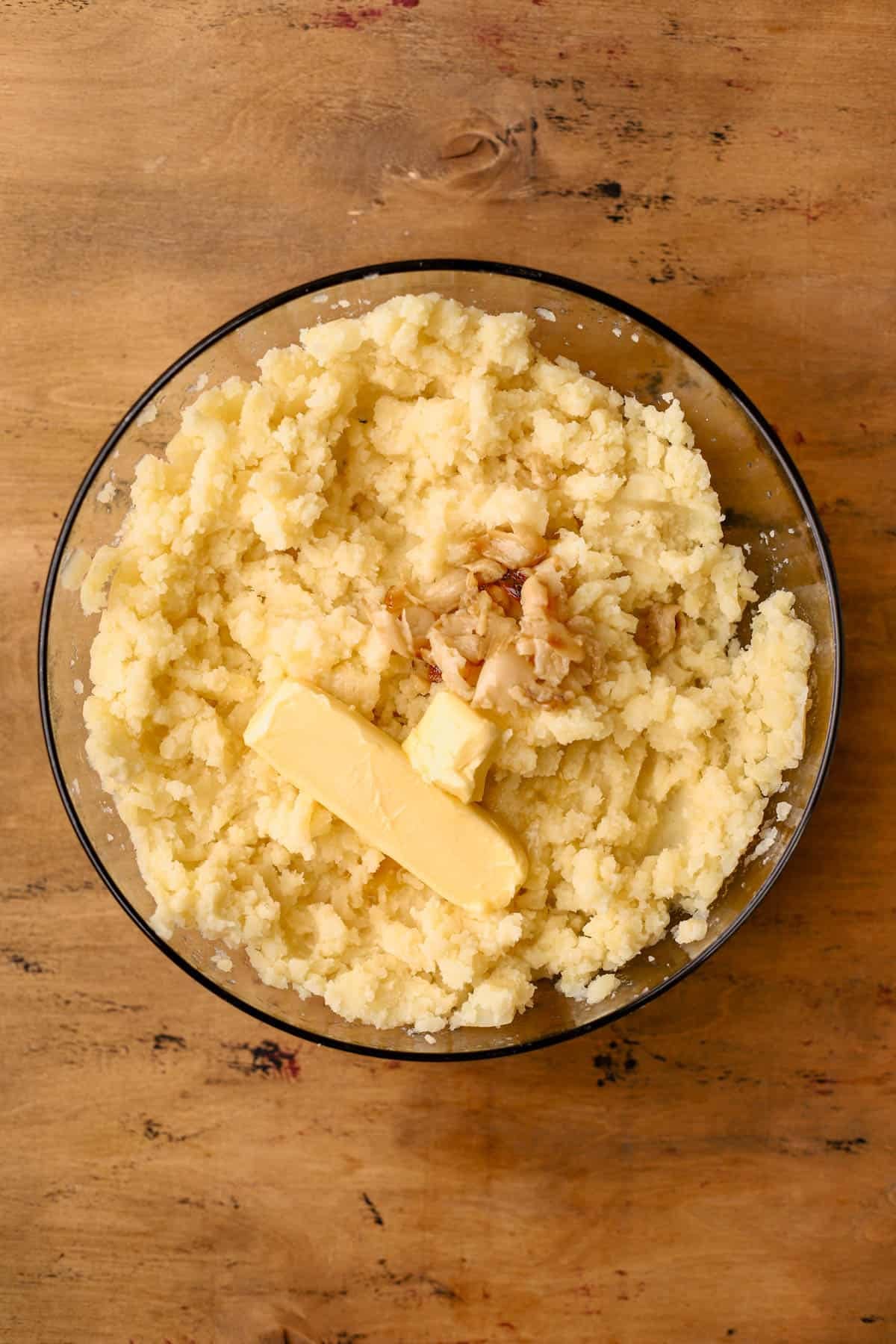 Gold potatoes, butter, and roasted garlic cloves. 