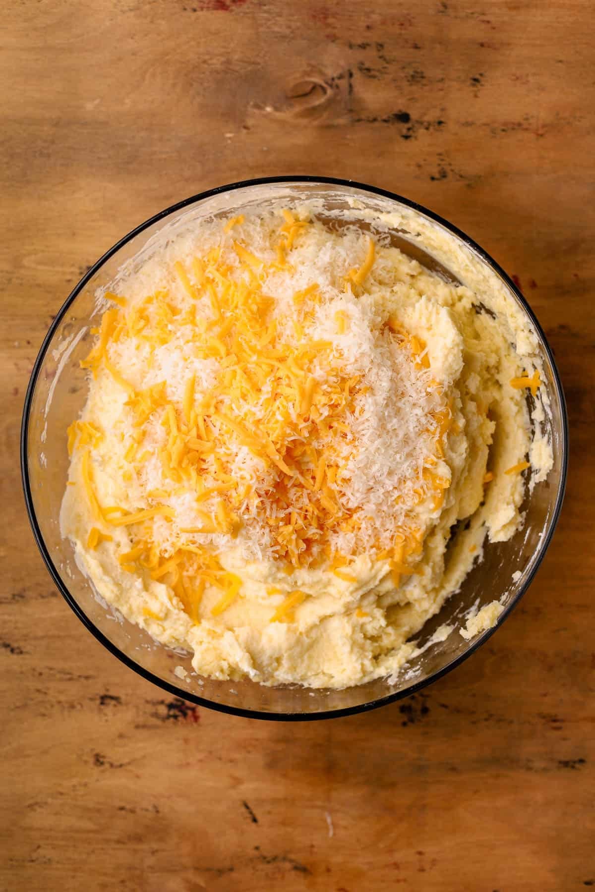 Gold potatoes, butter, roasted garlic cloves, sour cream, and cream cheese. 