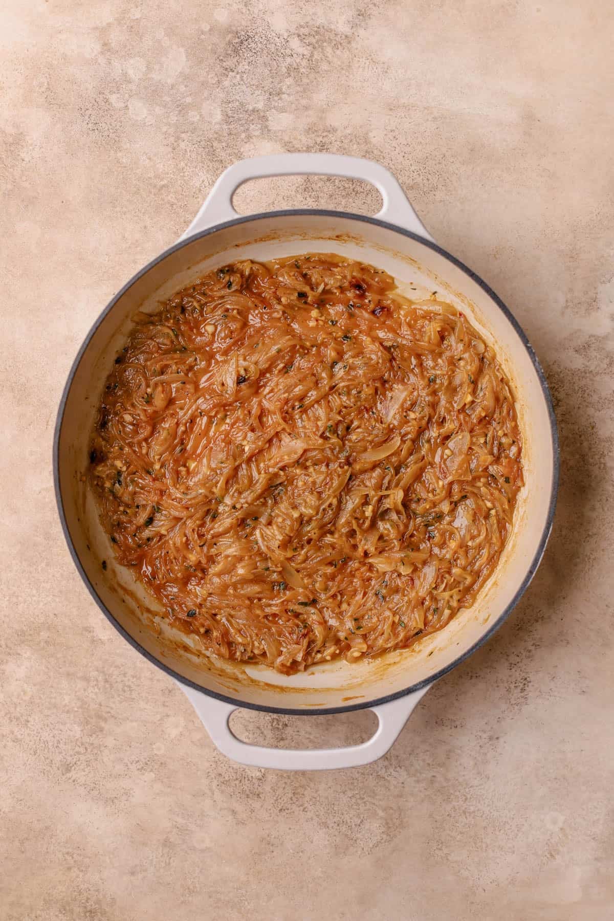 Caramelized onions with fresh thyme, garlic, white wine, and beef stock. 