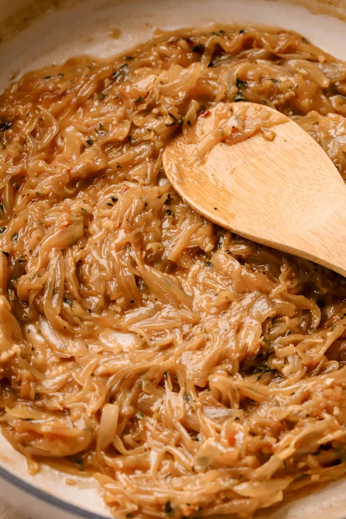 Caramelized onions with fresh thyme, white wine, garlic, and beef stock.