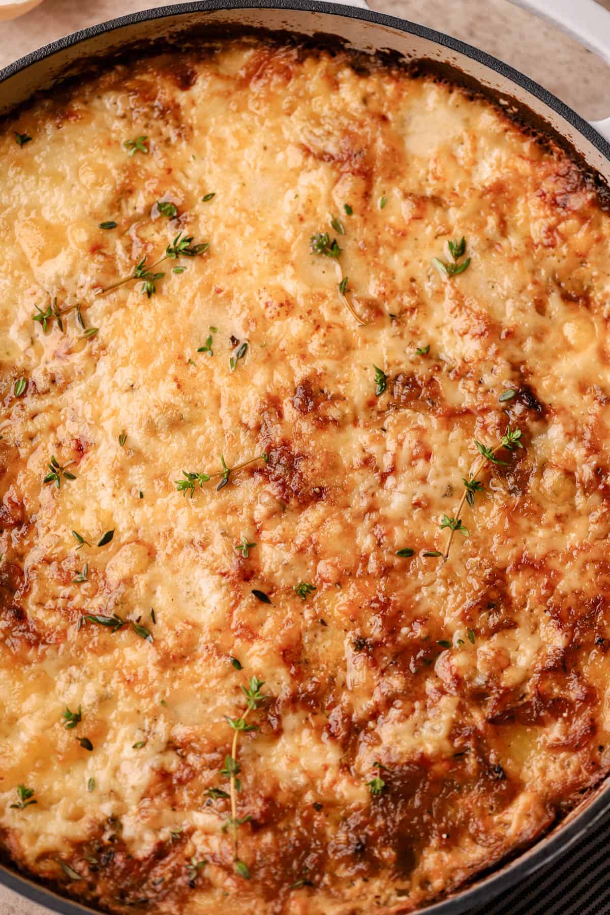 French onion soup potatoes are made with caramelized onions, white wine, fresh thyme, milk, cream, Gruyere, cheddar and Parmesan cheese.