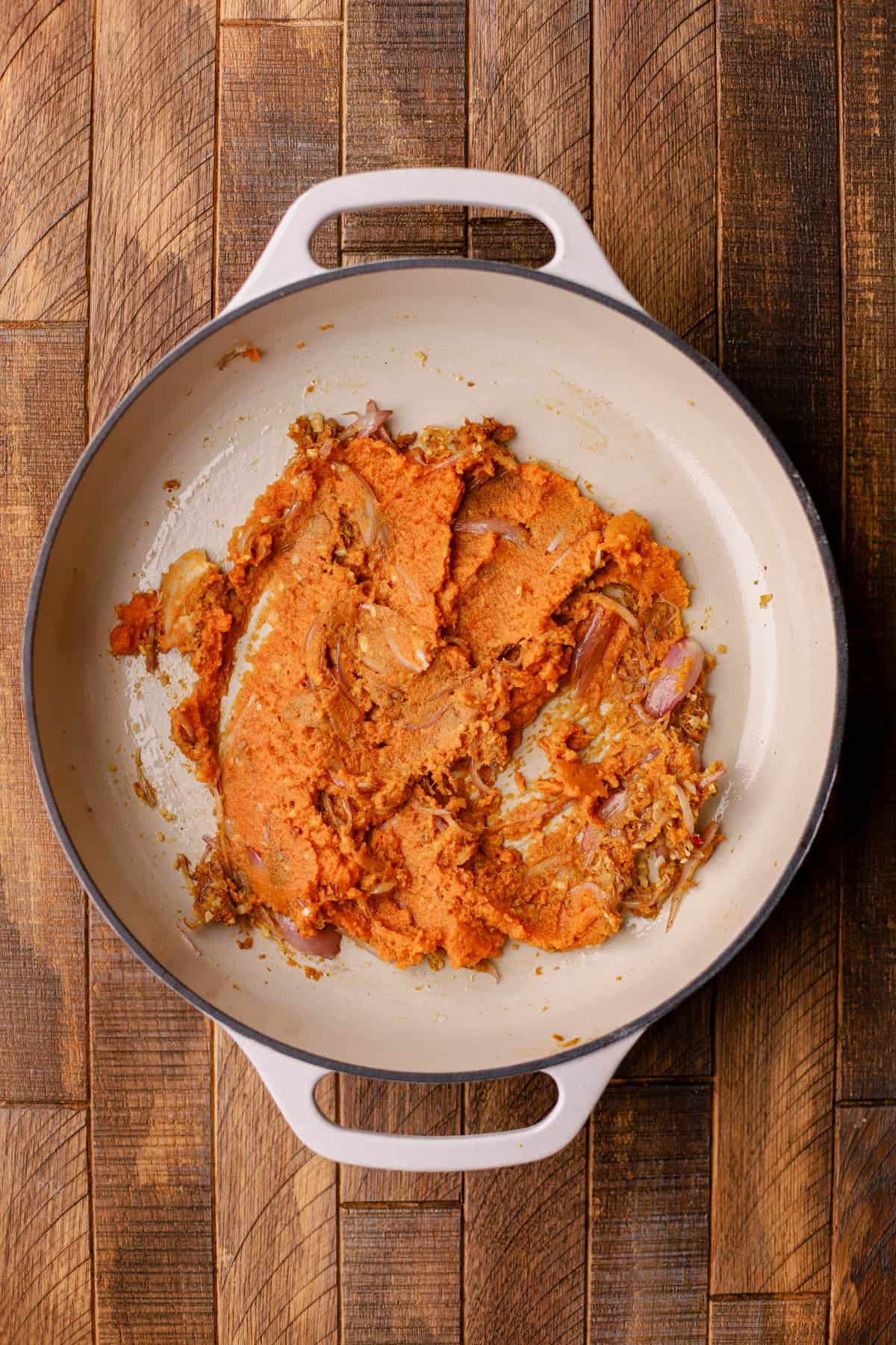 Sauteed shallots, garlic, ginger, yellow curry paste, and pumpkin puree. 