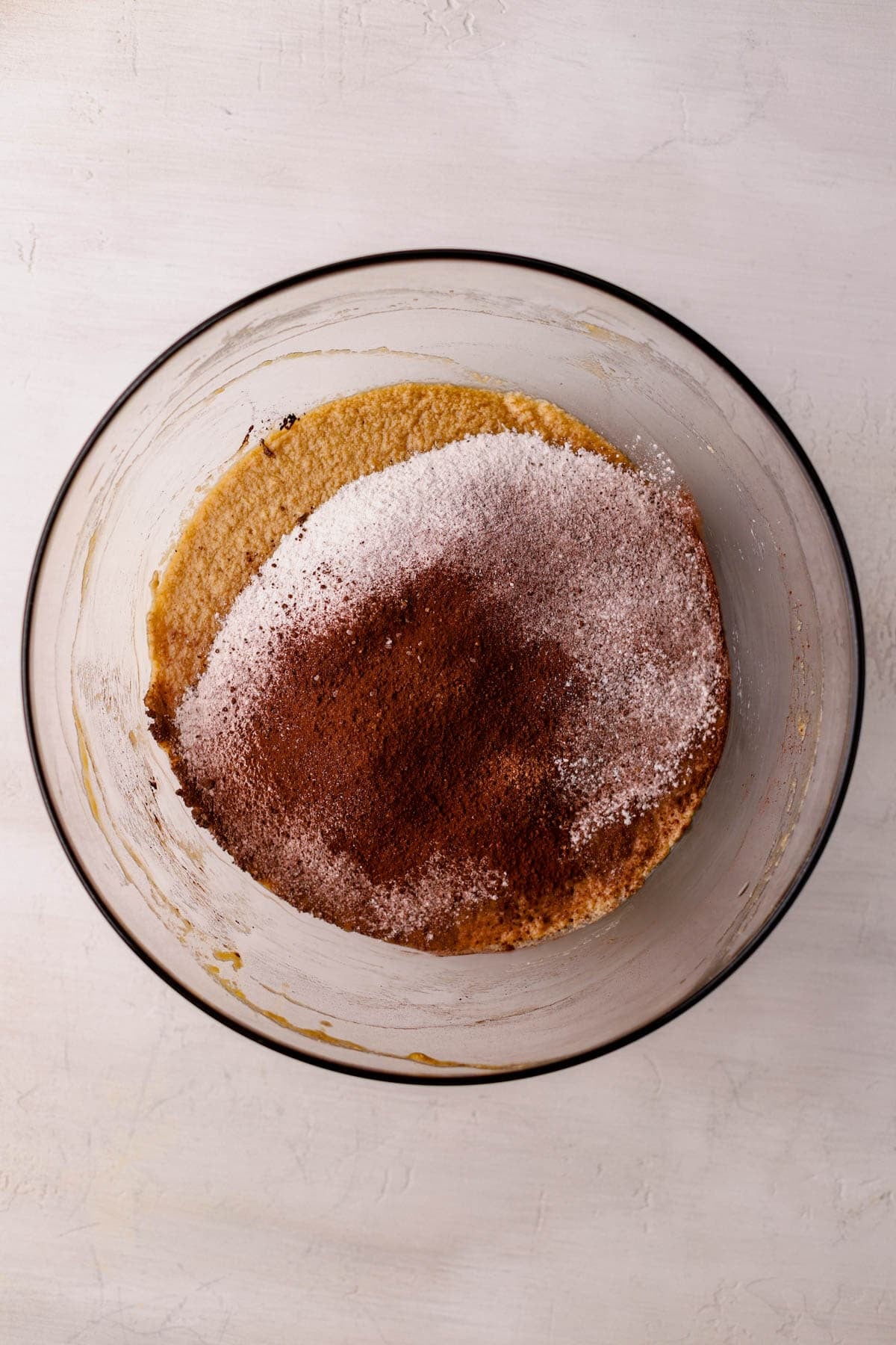 Melted butter, eggs, vanilla bean paste, sugar, brown sugar, cocoa powder, salt, and flour. 