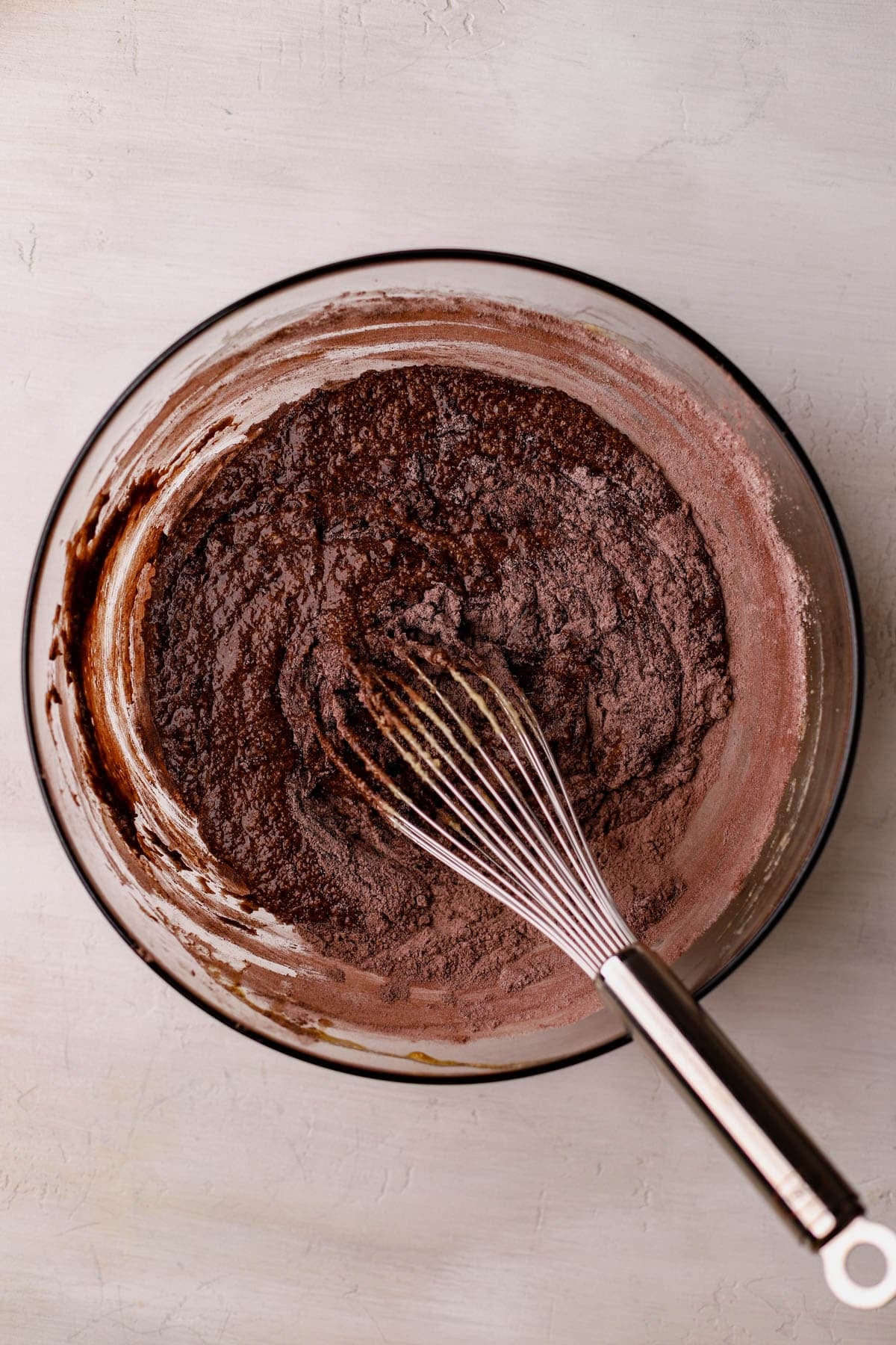 Melted butter, eggs, vanilla bean paste, sugar, brown sugar, cocoa powder, salt, and flour. 