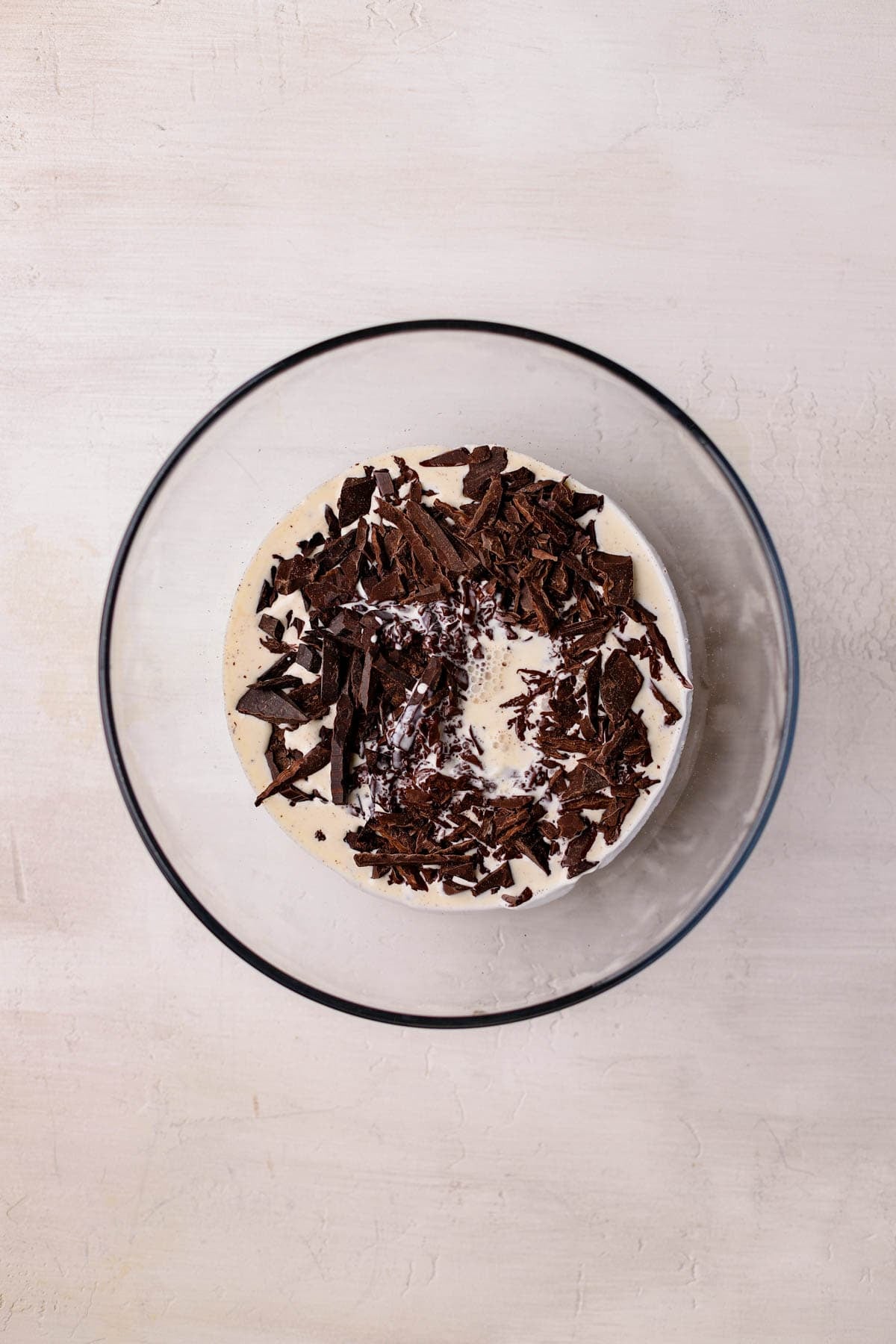 Chopped chocolate and warm heavy cream.