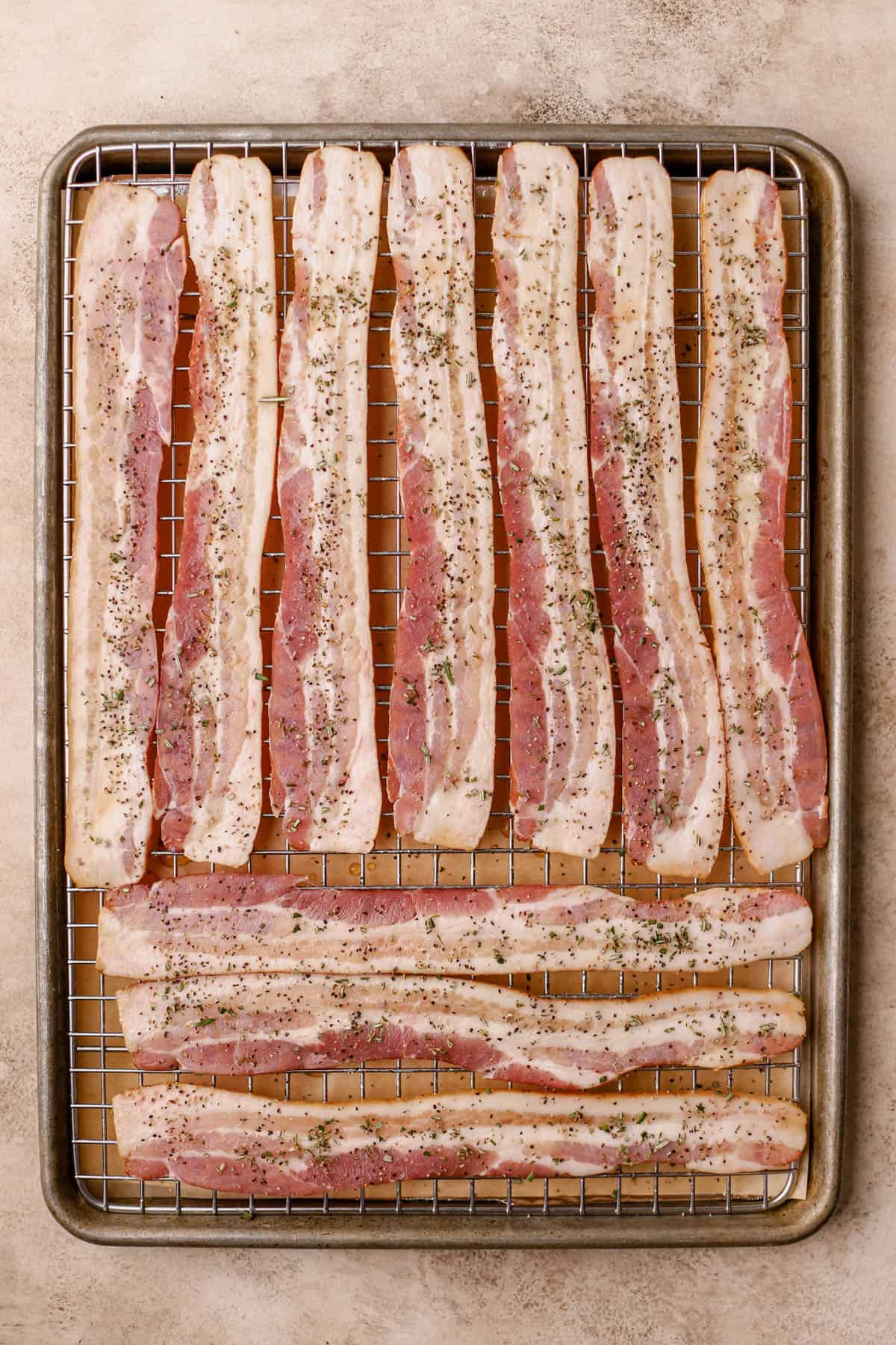 Bacon brushed with maple syrup, rosemary, pepper, and paprika.