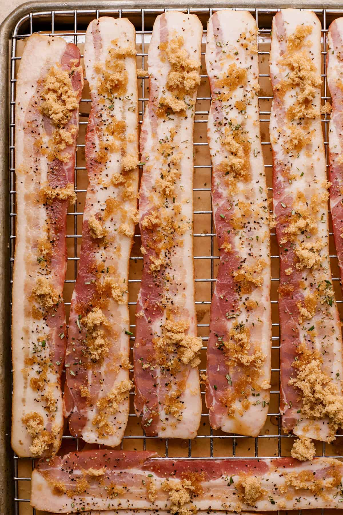 Bacon coated in maple syrup, brown sugar, rosemary, pepper, and brown sugar.