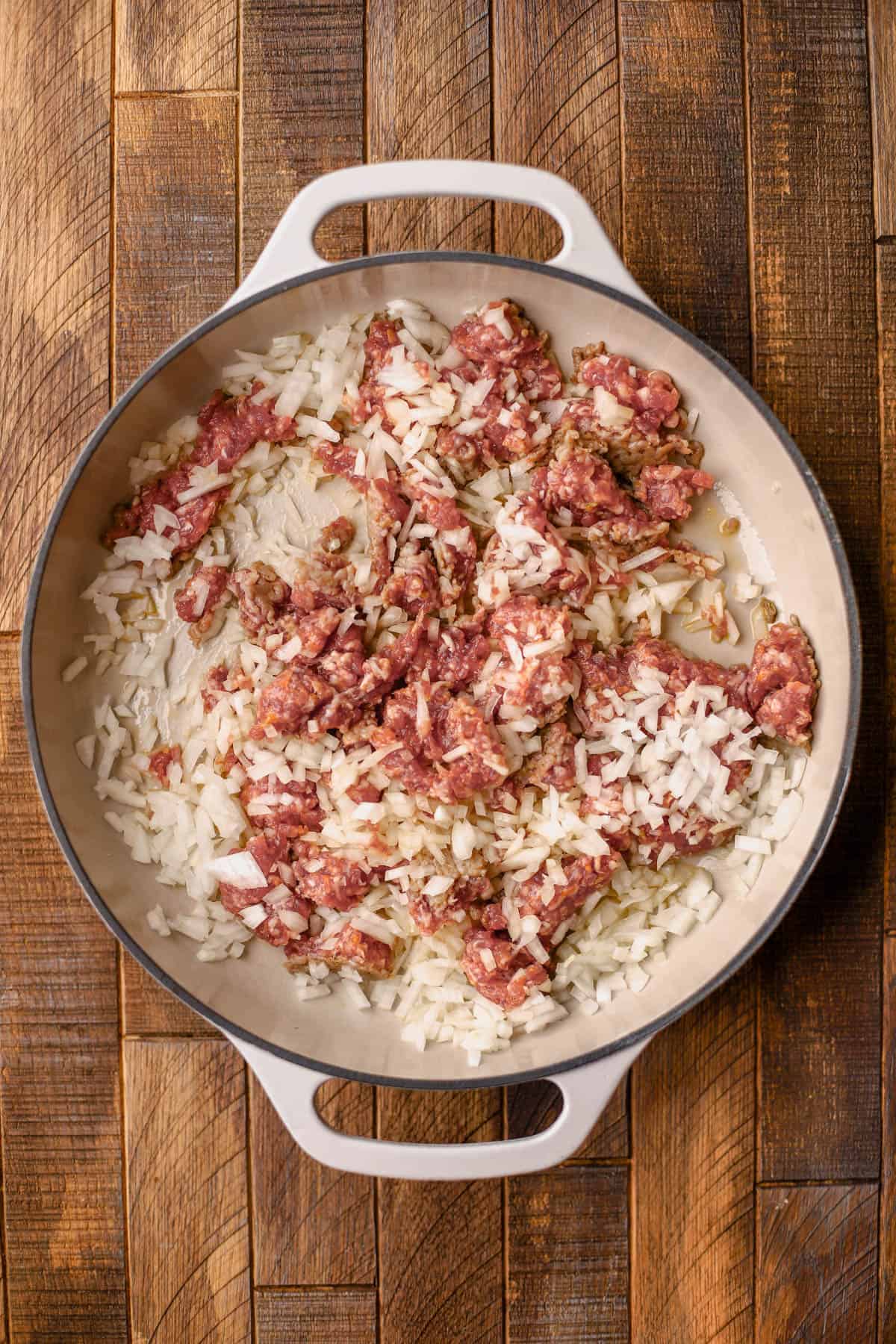 Italian sausage, olive oil, and yellow onions.