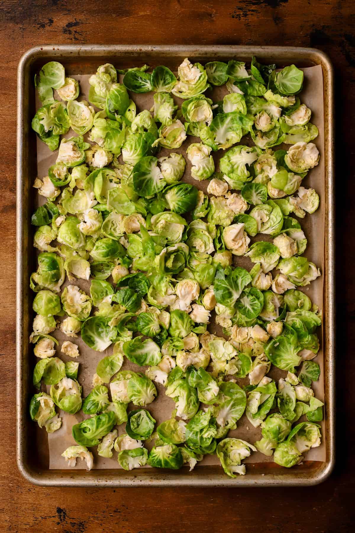 Prepared Brussels sprouts with olive oil, salt, and pepper.
