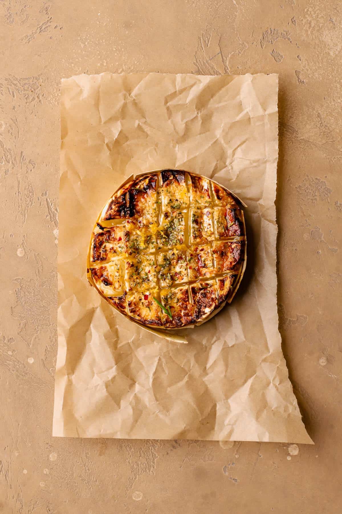 Brie infused with garlic, rosemary, lemon zest, honey, and red chili flakes. 