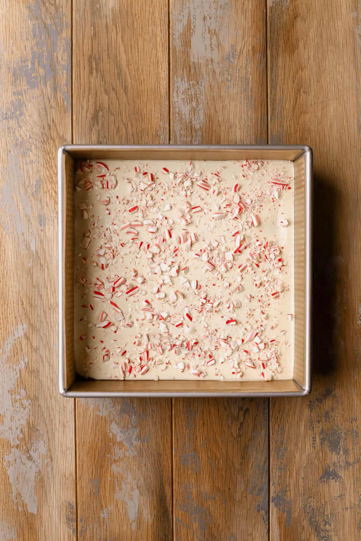 Crushed candy canes sprinkled on top of chocolate layers.