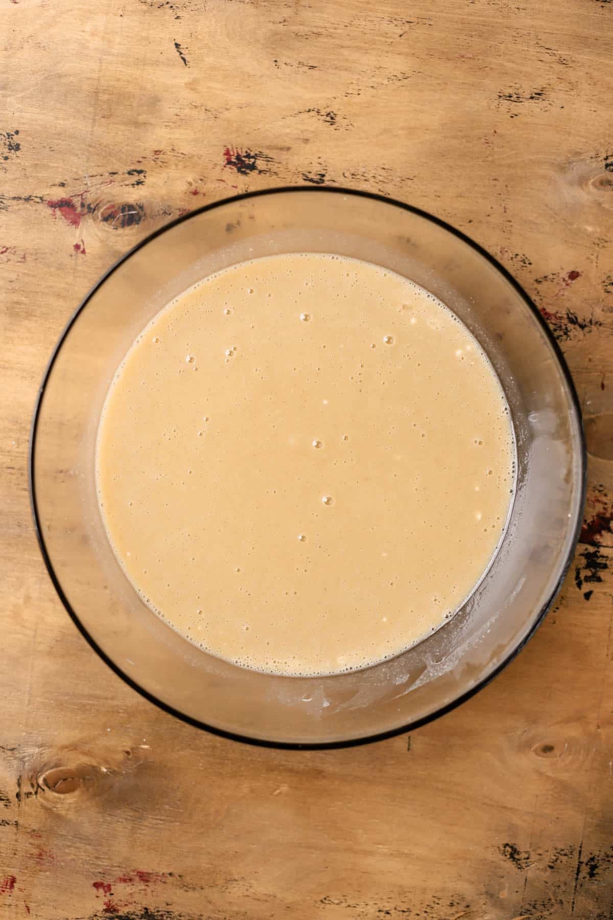 Mixed brown sugar, sugar, canola oil, vanilla, eggs, sour cream, and milk.