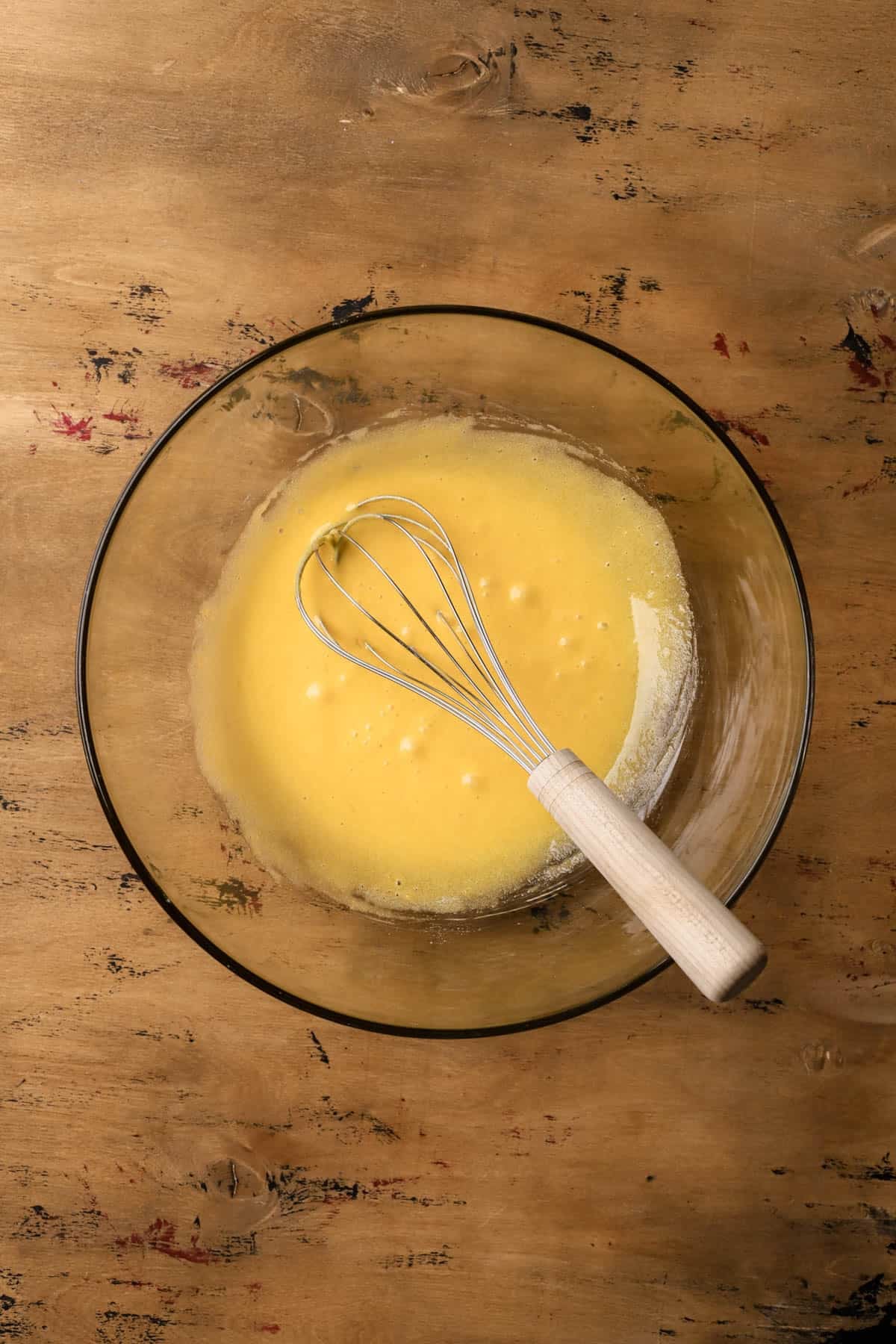 Whisked egg yolks with sugar. 