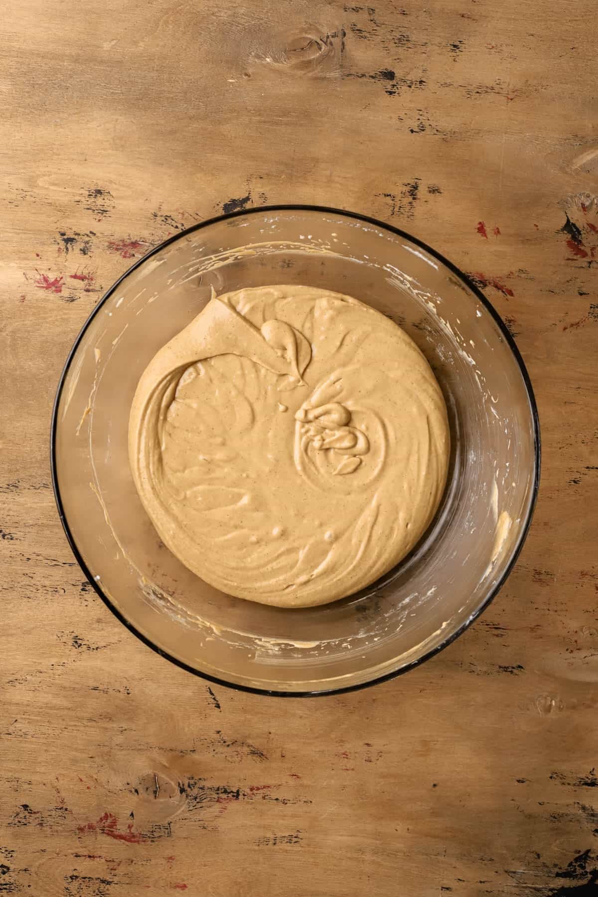 Thickened egg yolks, sugar, molasses, ground ginger, cinnamon, cloves, nutmeg, and vanilla bean paste. 